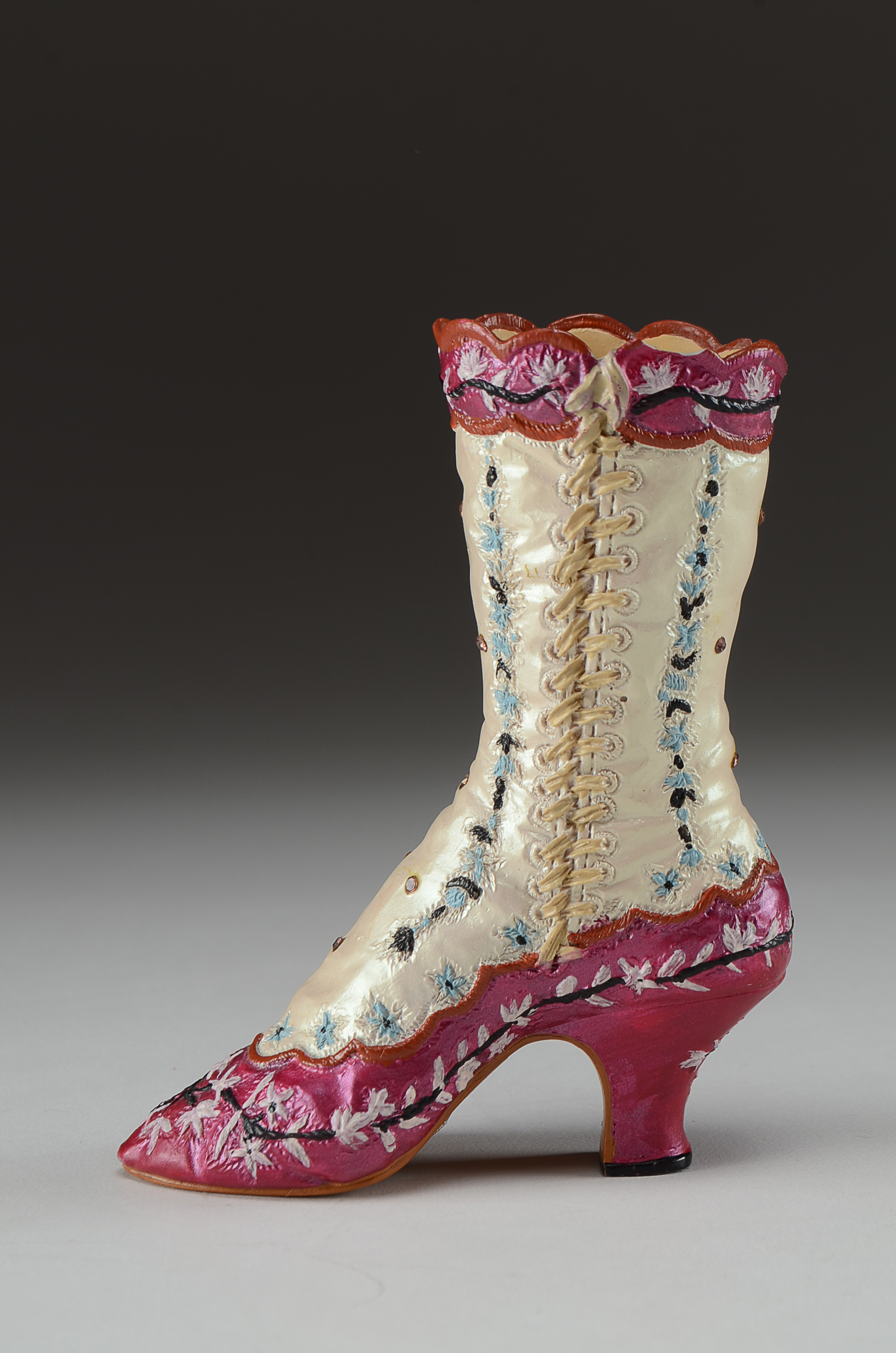 Collection of Four Miniature Resin Shoe Figurines Including Nostalgia