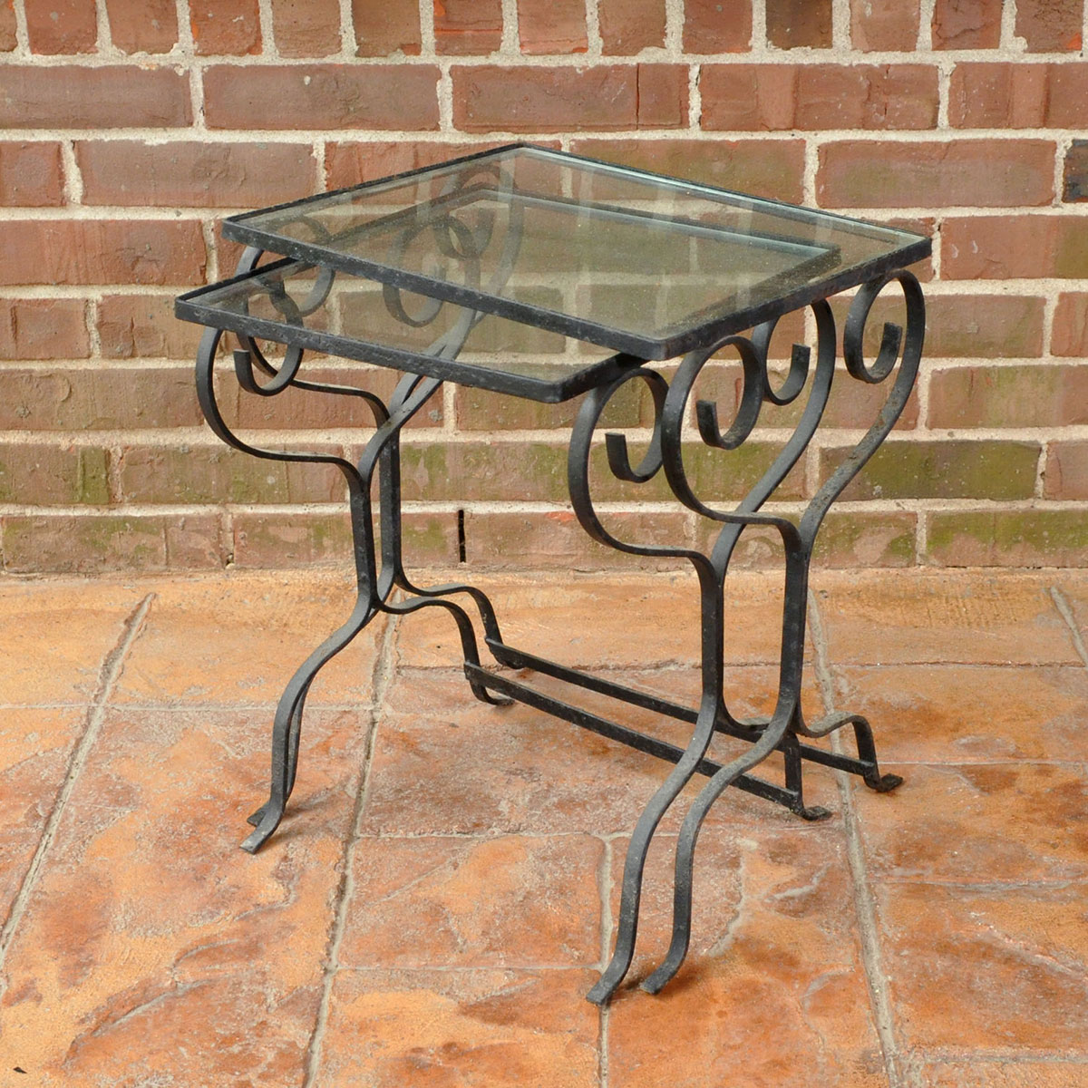 Pair of Wrought Iron and Glass Patio Nesting Tables EBTH