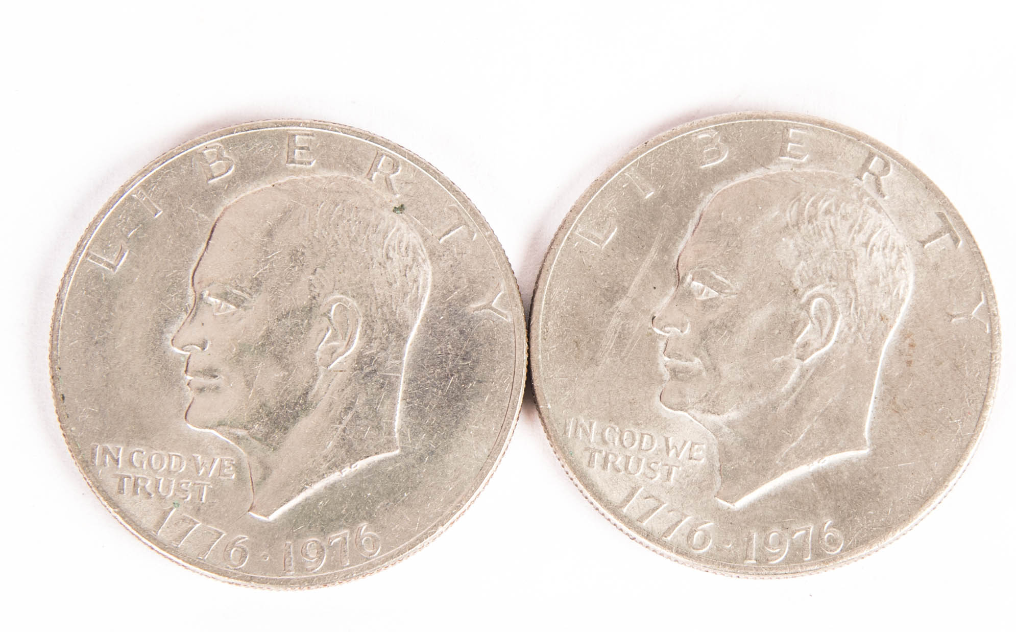 Four 17761976 Eisenhower Bicentennial Liberty Bell Dollars EBTH