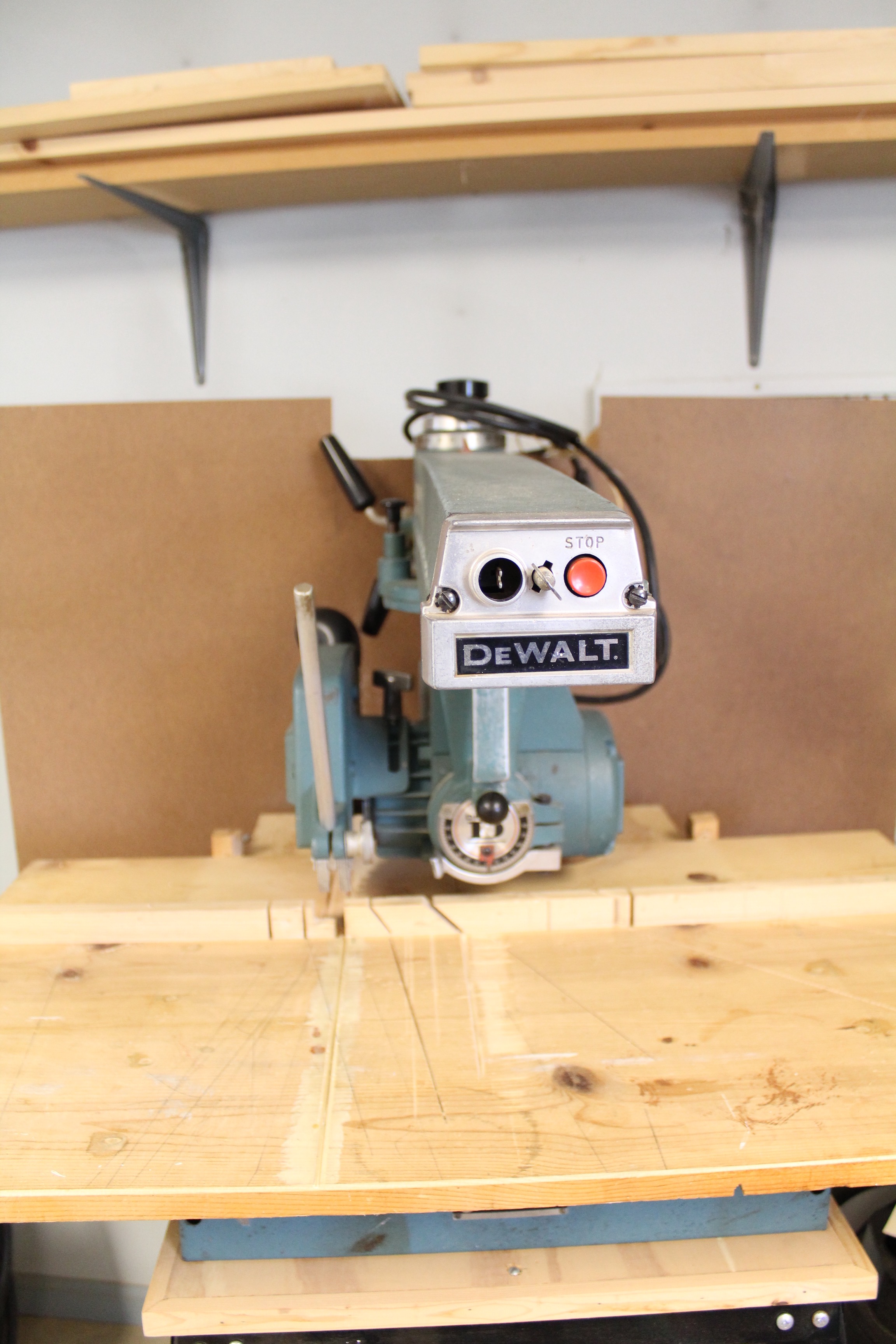 DeWalt Power Shop Radial Arm Saw on Stand and Wall of Blades EBTH