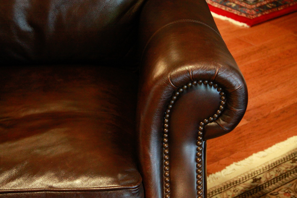 Haverty's Leather Chair and Ottoman EBTH