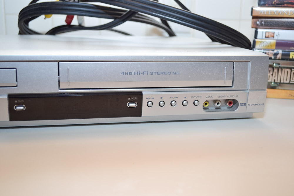 Insignia Super Slim DVD/VCR with Generous Collection of DVDs and VHS