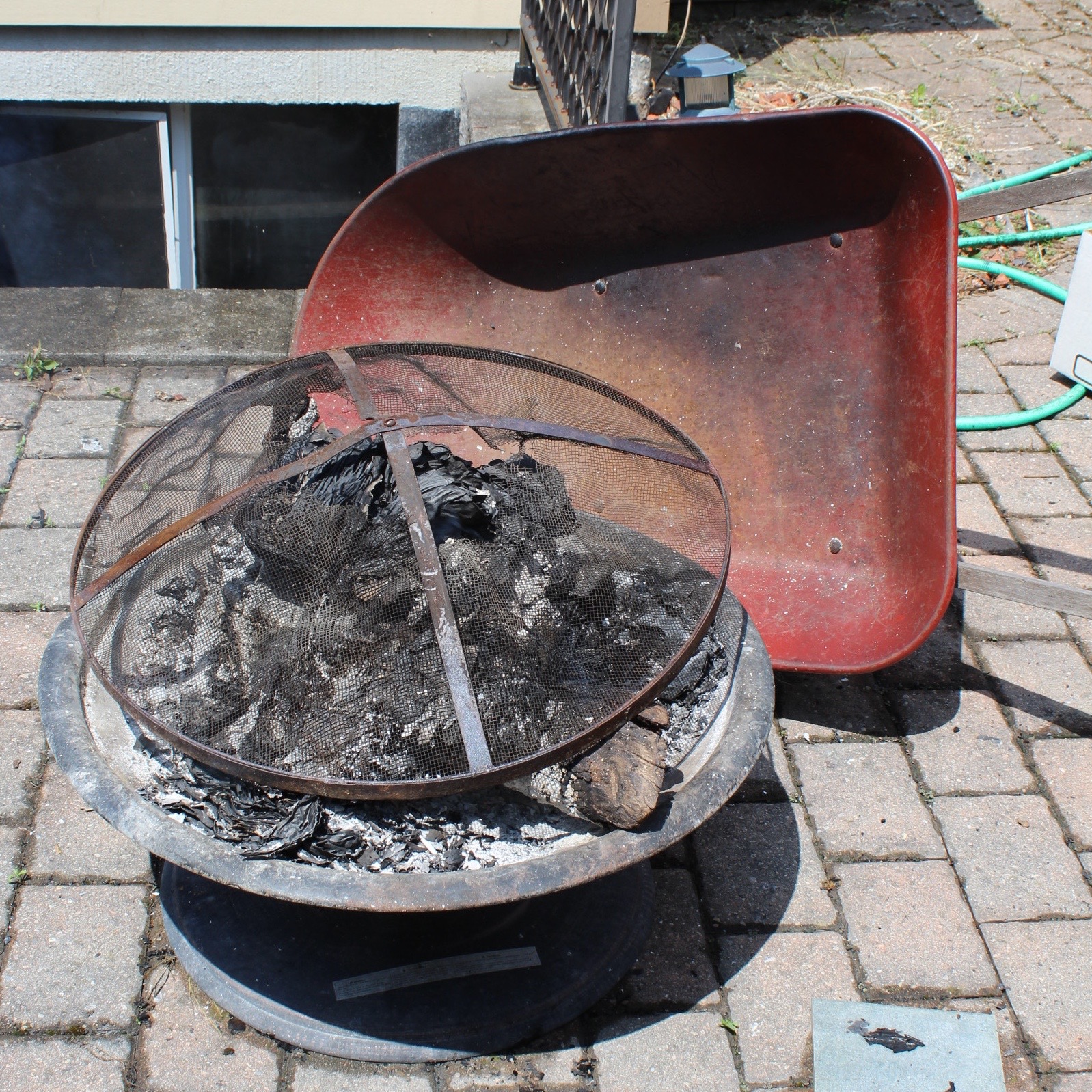 Fire Pit and Wheelbarrow | EBTH