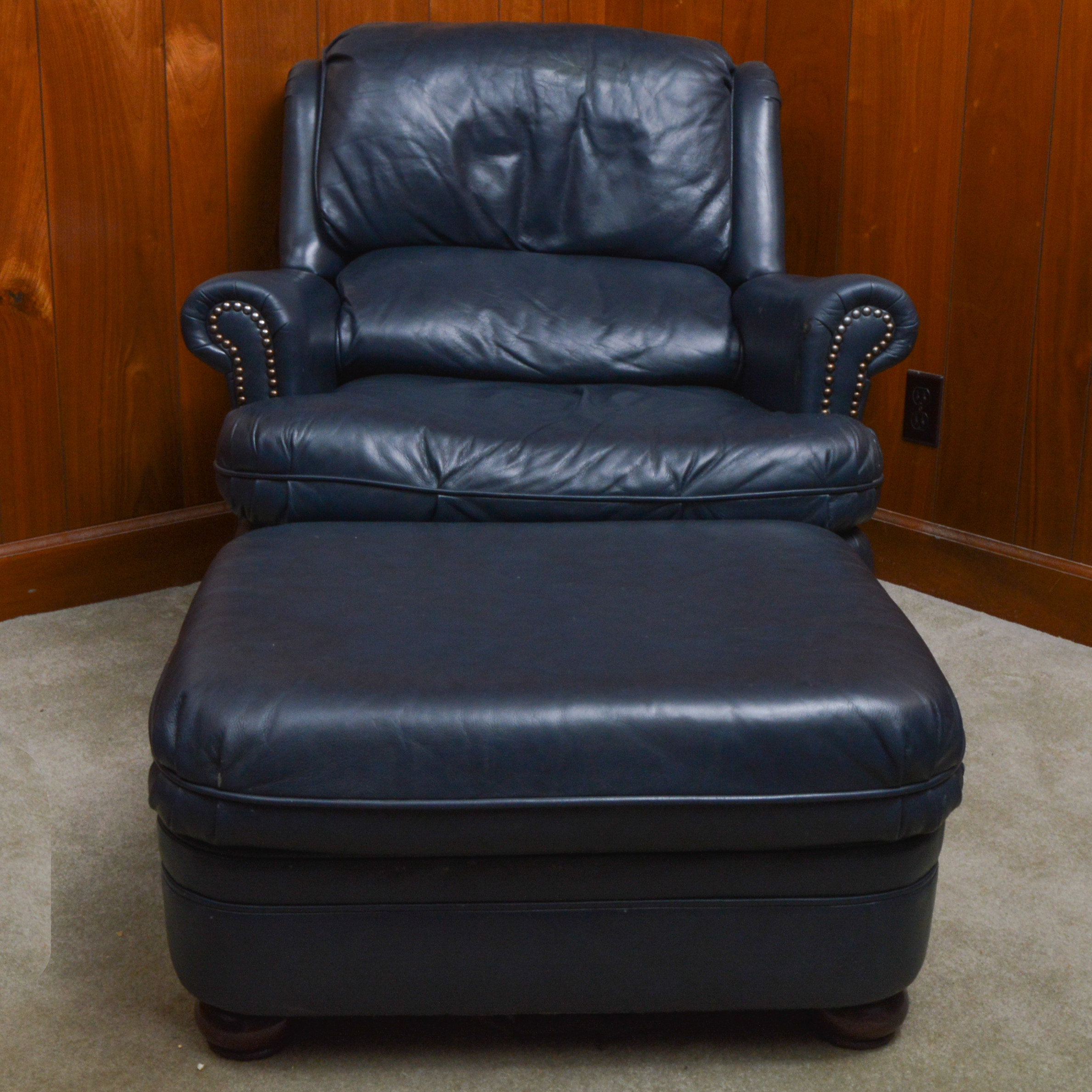Navy Blue Leather Armchair and Ottoman EBTH