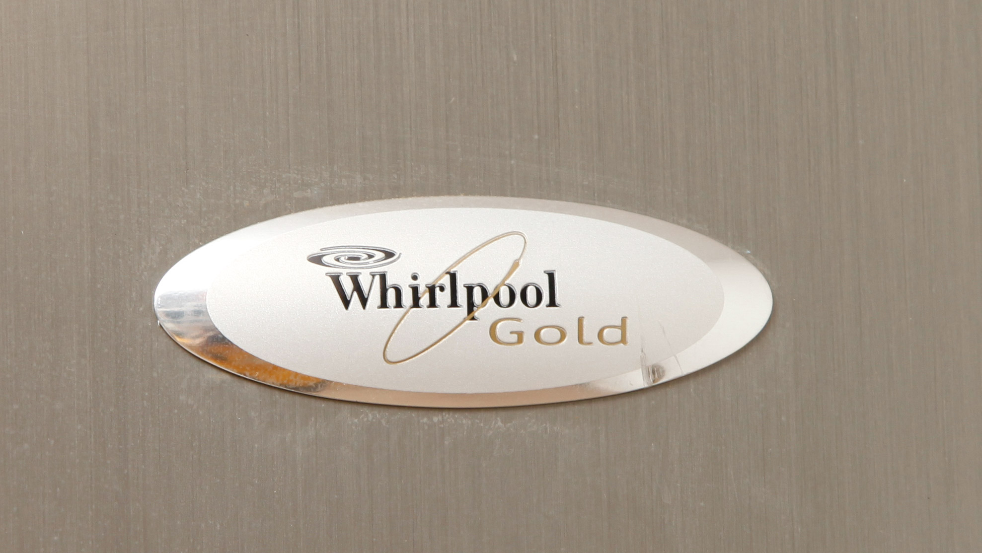 Silver "Whirlpool Gold" Refrigerator with Conquest Ice Filter EBTH