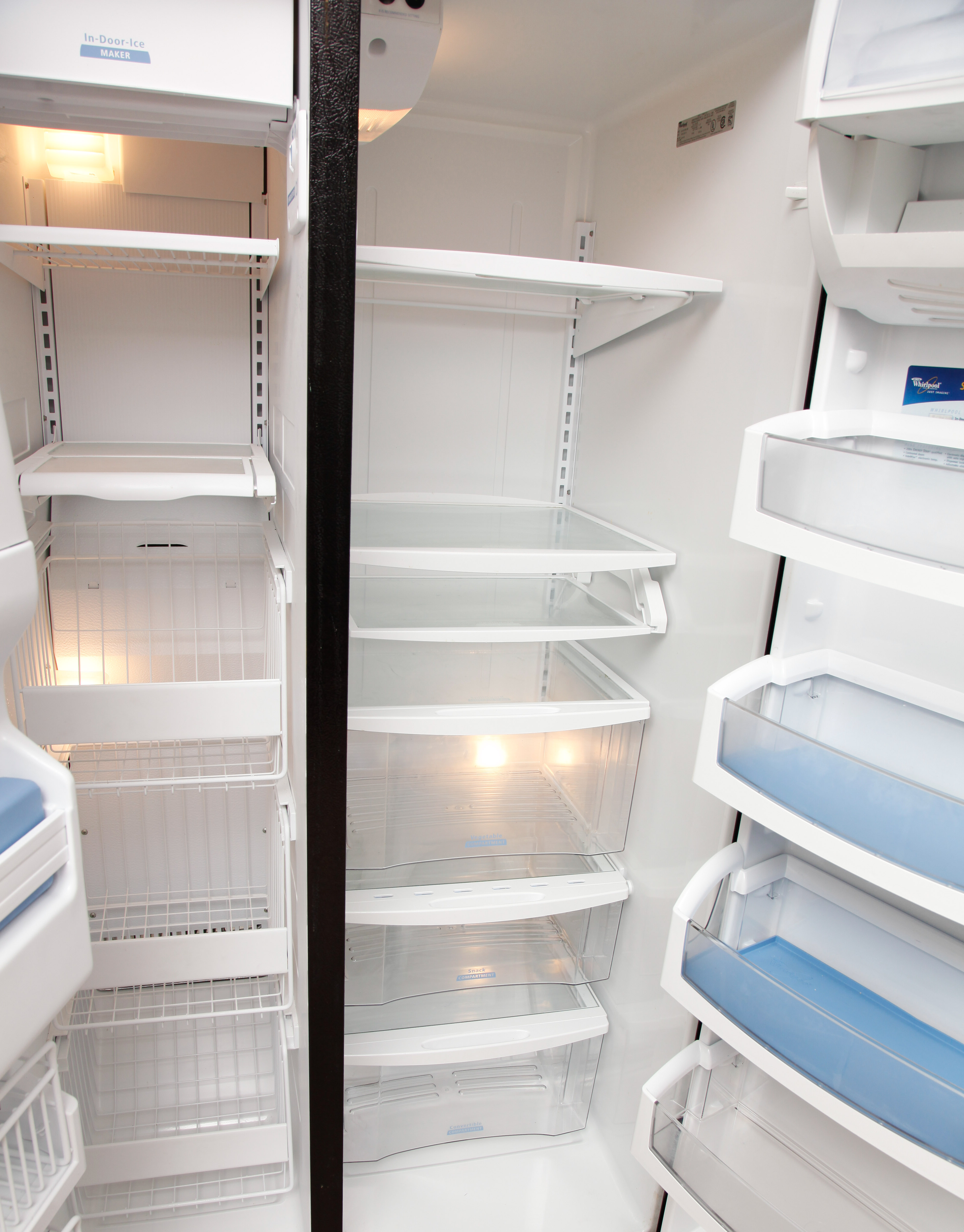 Silver "Whirlpool Gold" Refrigerator with Conquest Ice Filter EBTH