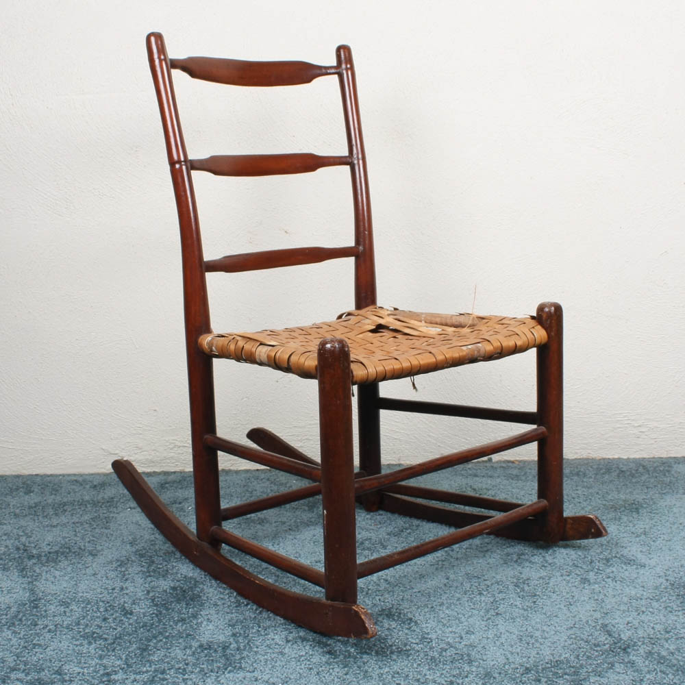 antique childs rocking chair with cane seat