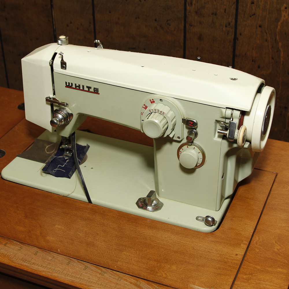 Vintage White Sewing Machine and Table EBTH