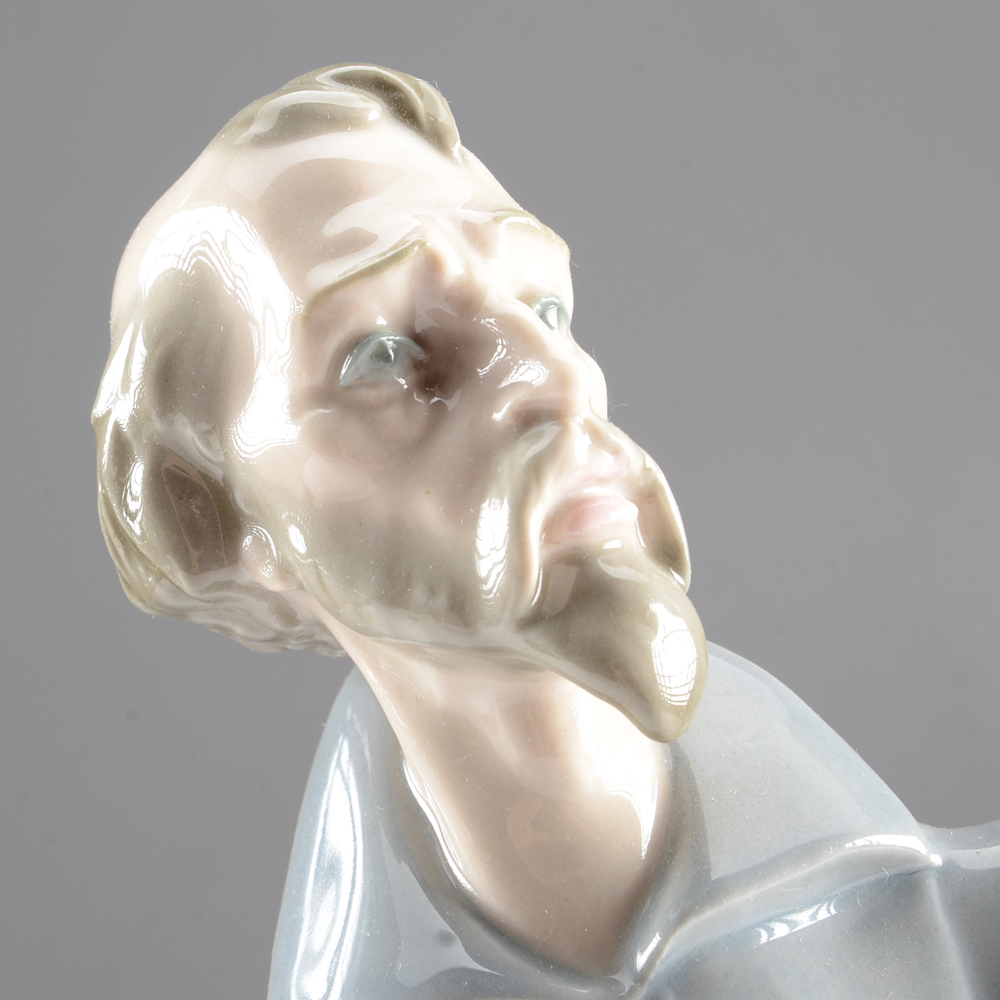 Lladro Man with Sword and Book EBTH