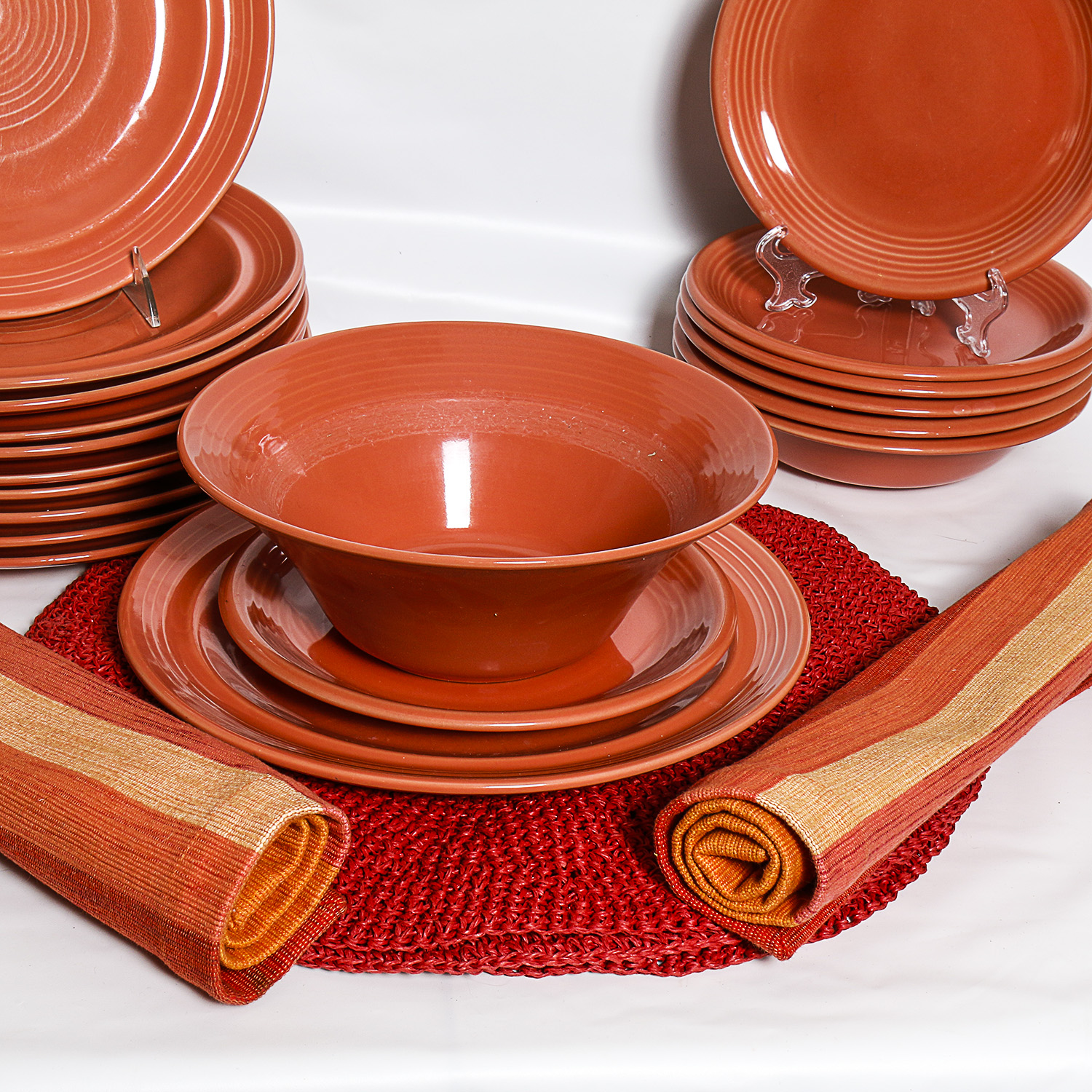 Salmon Colored Stoneware Dishes and Placemats | EBTH