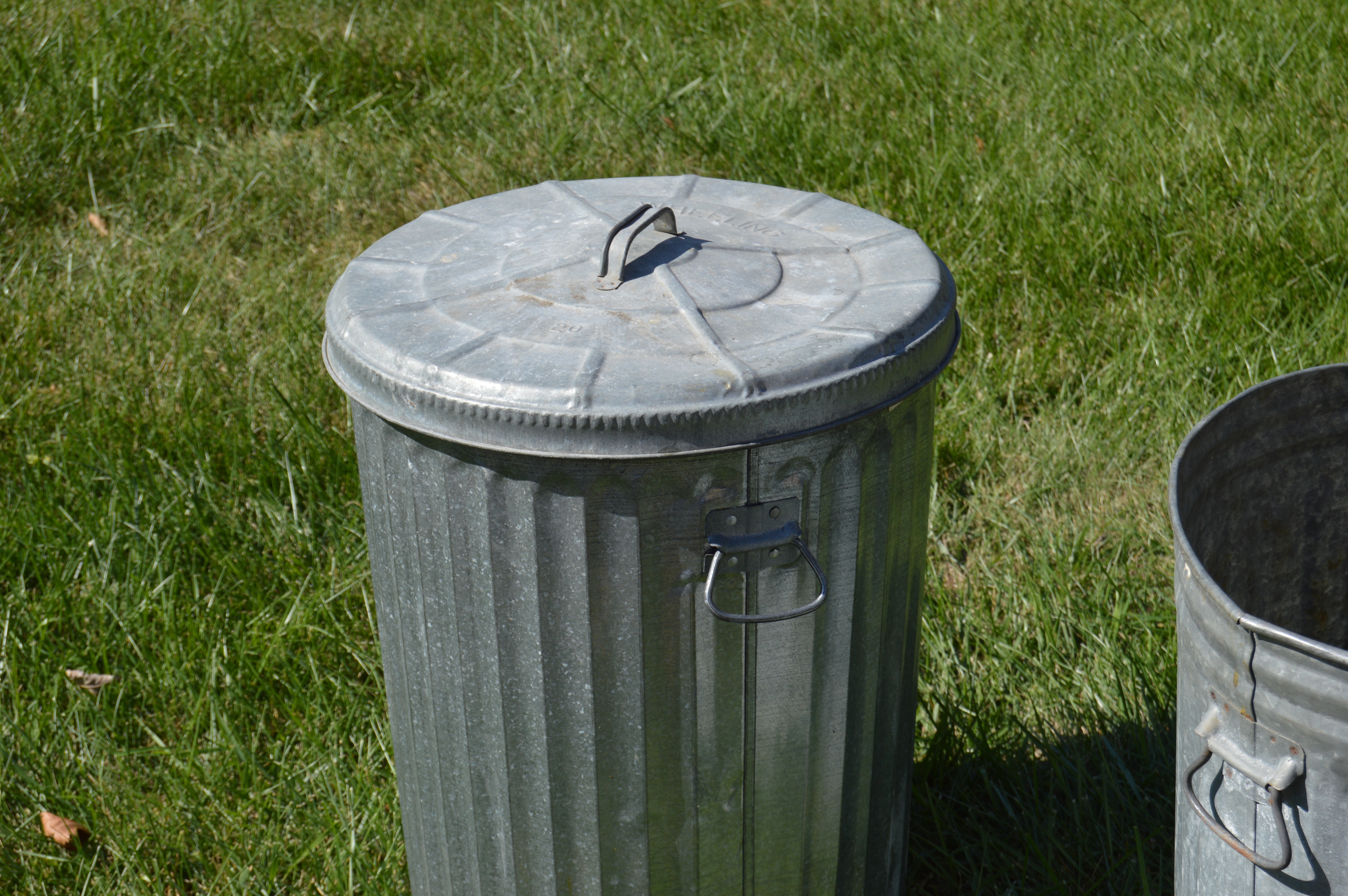 Two Vintage Wheeling Metal Trash Cans EBTH