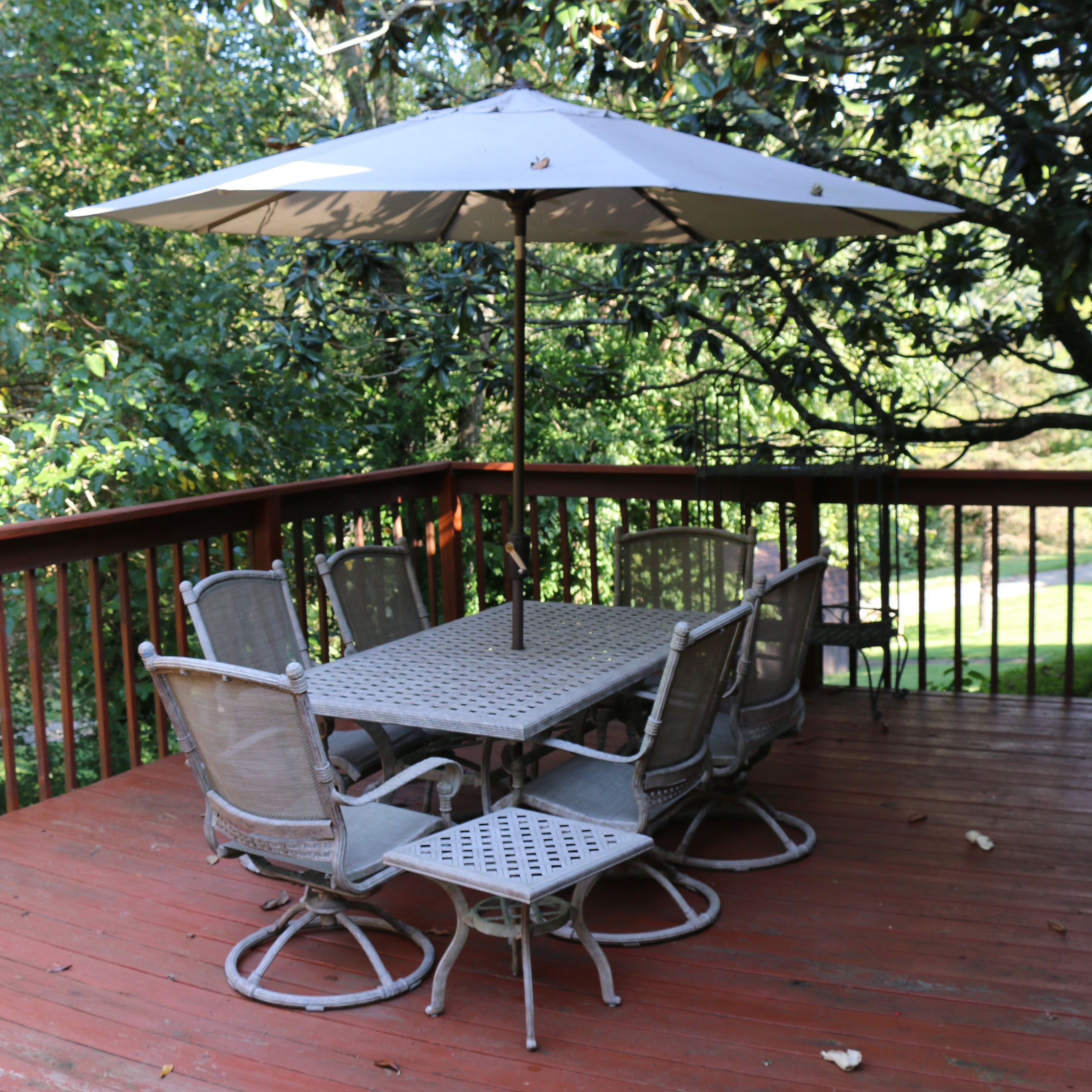 Early 21st Century Nine-Piece Patio Dining Set