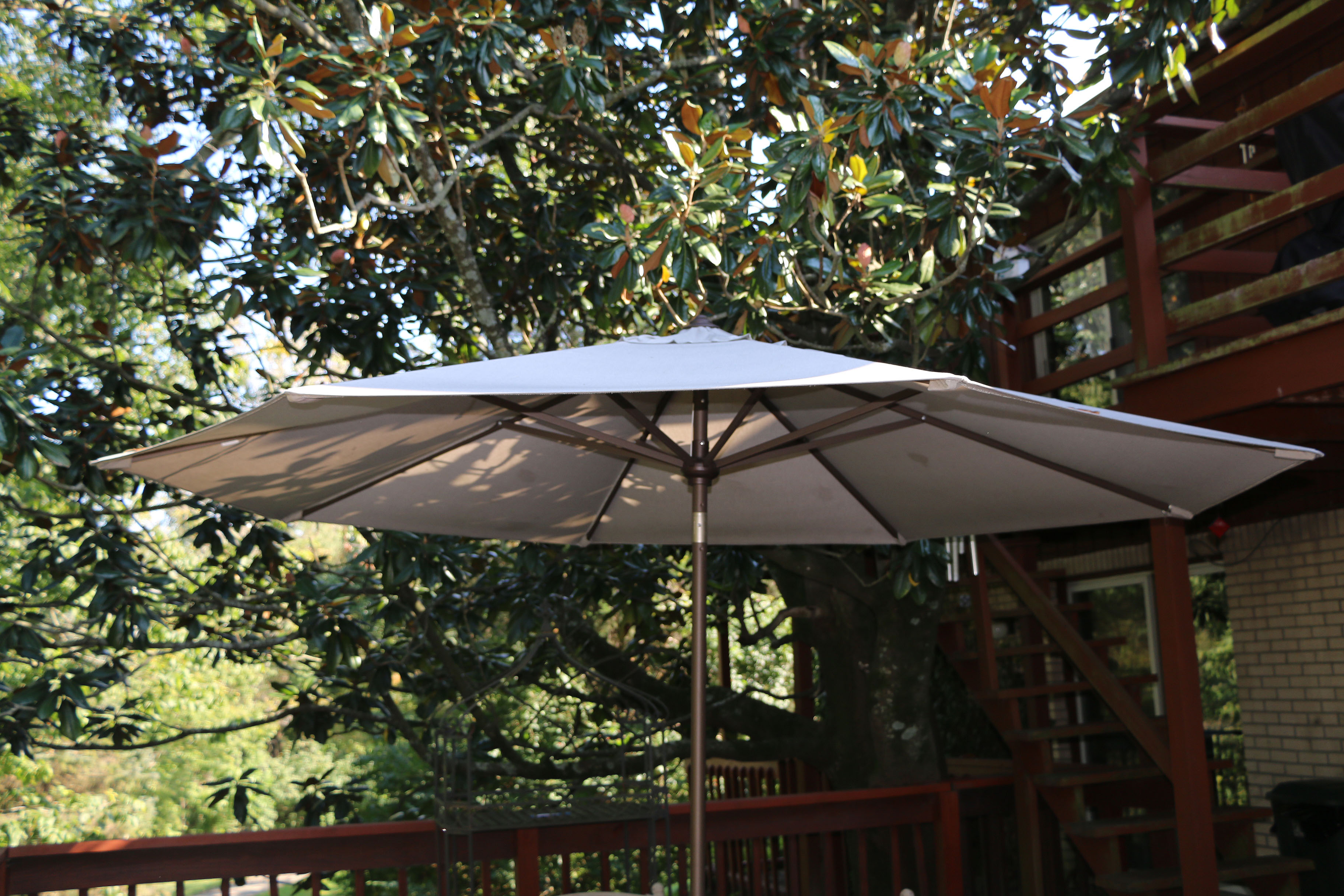 Early 21st Century Nine-Piece Patio Dining Set