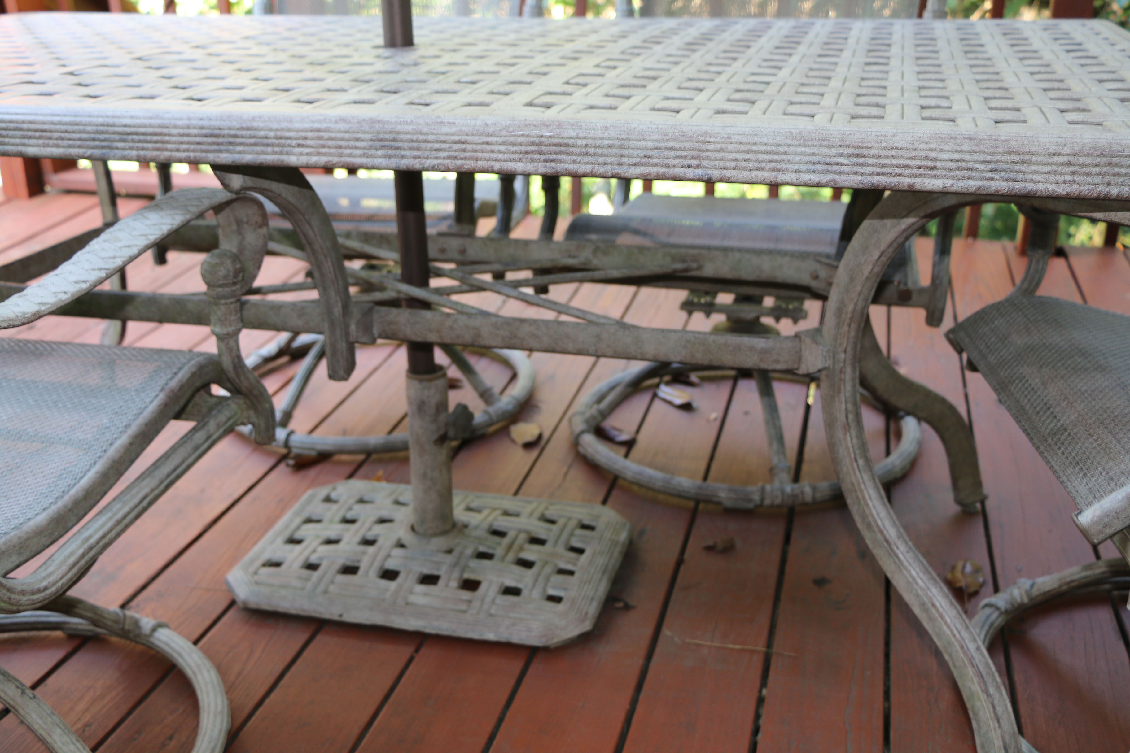 Early 21st Century Nine-Piece Patio Dining Set