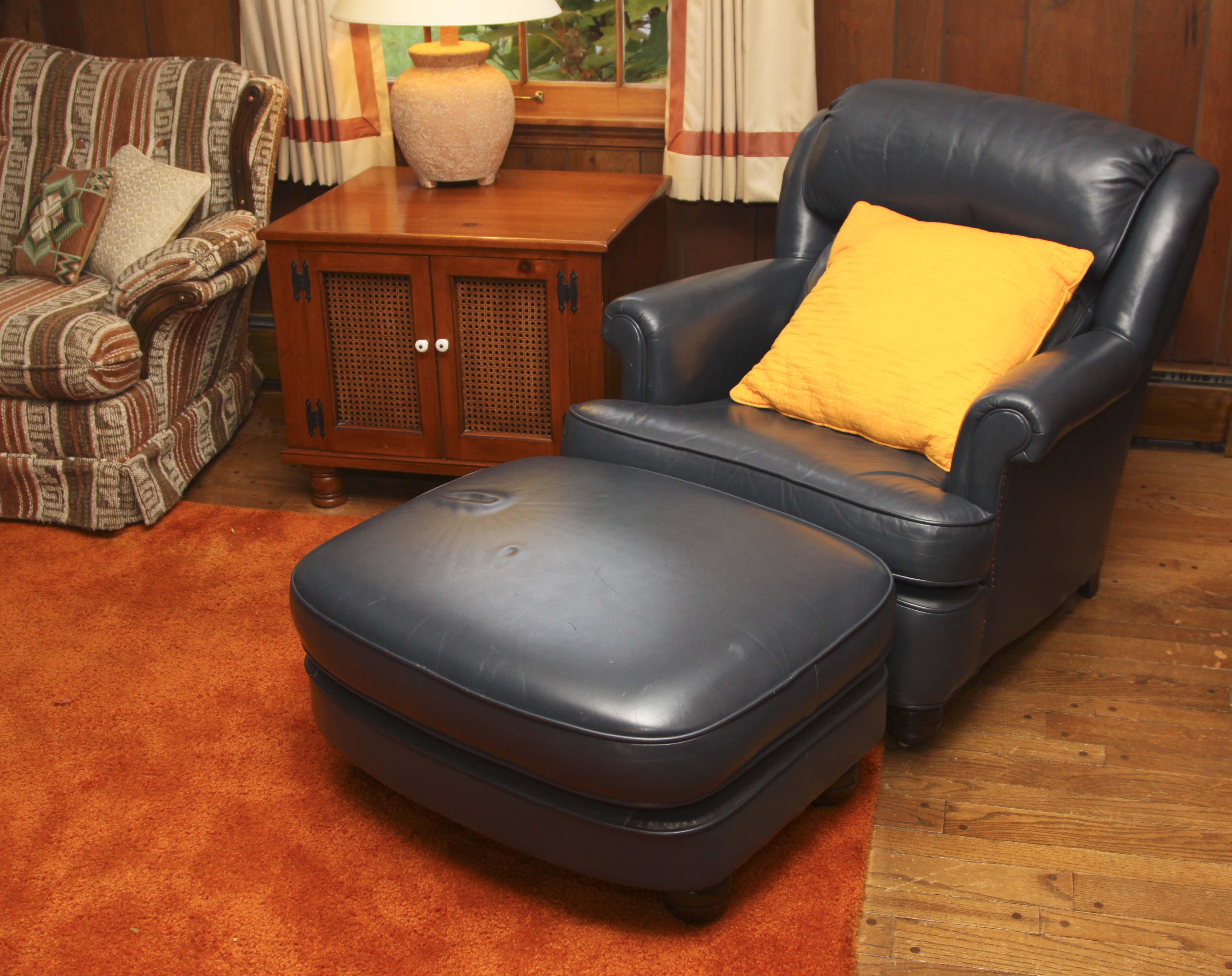 Navy Blue Leather Chair and Ottoman EBTH