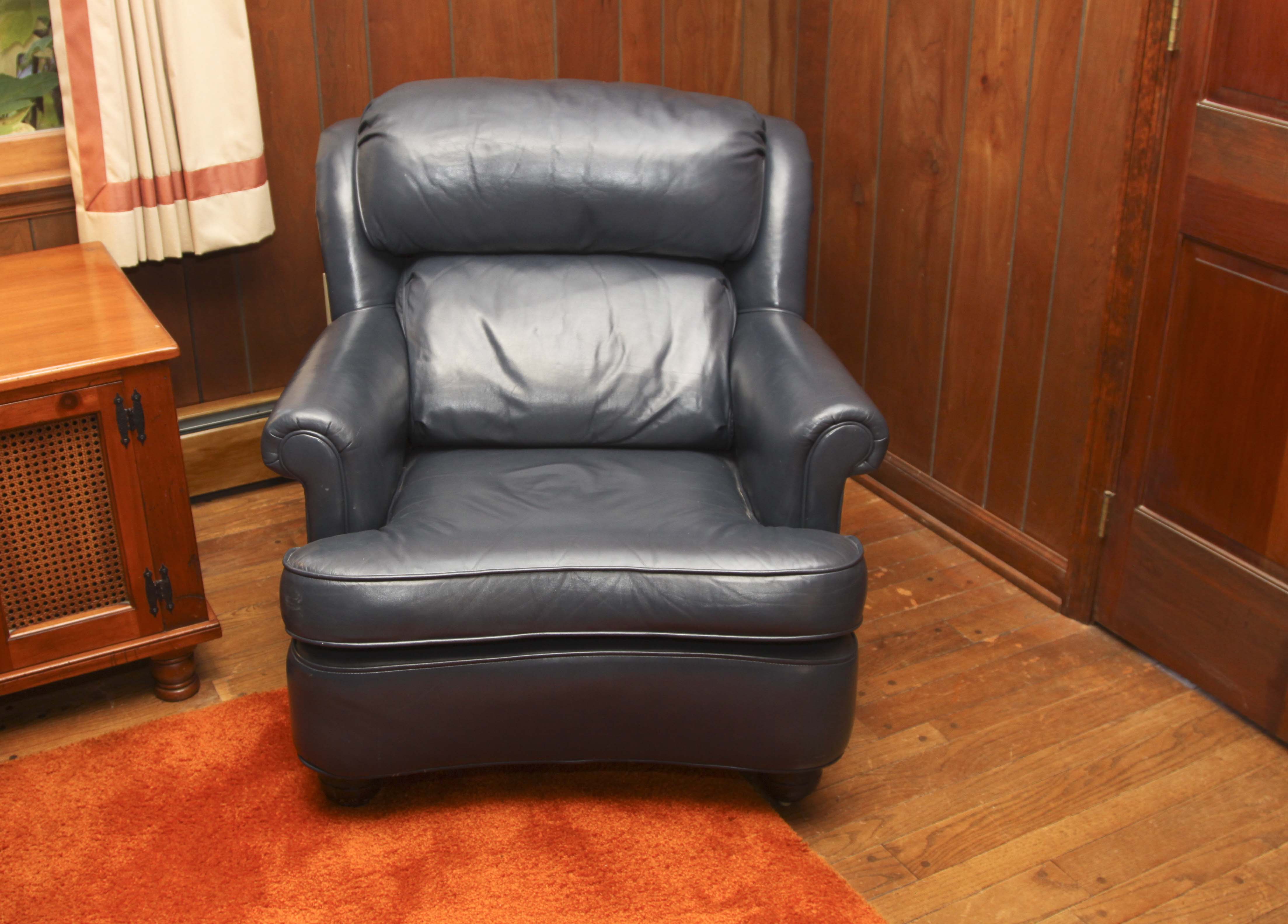 Navy Blue Leather Chair and Ottoman EBTH