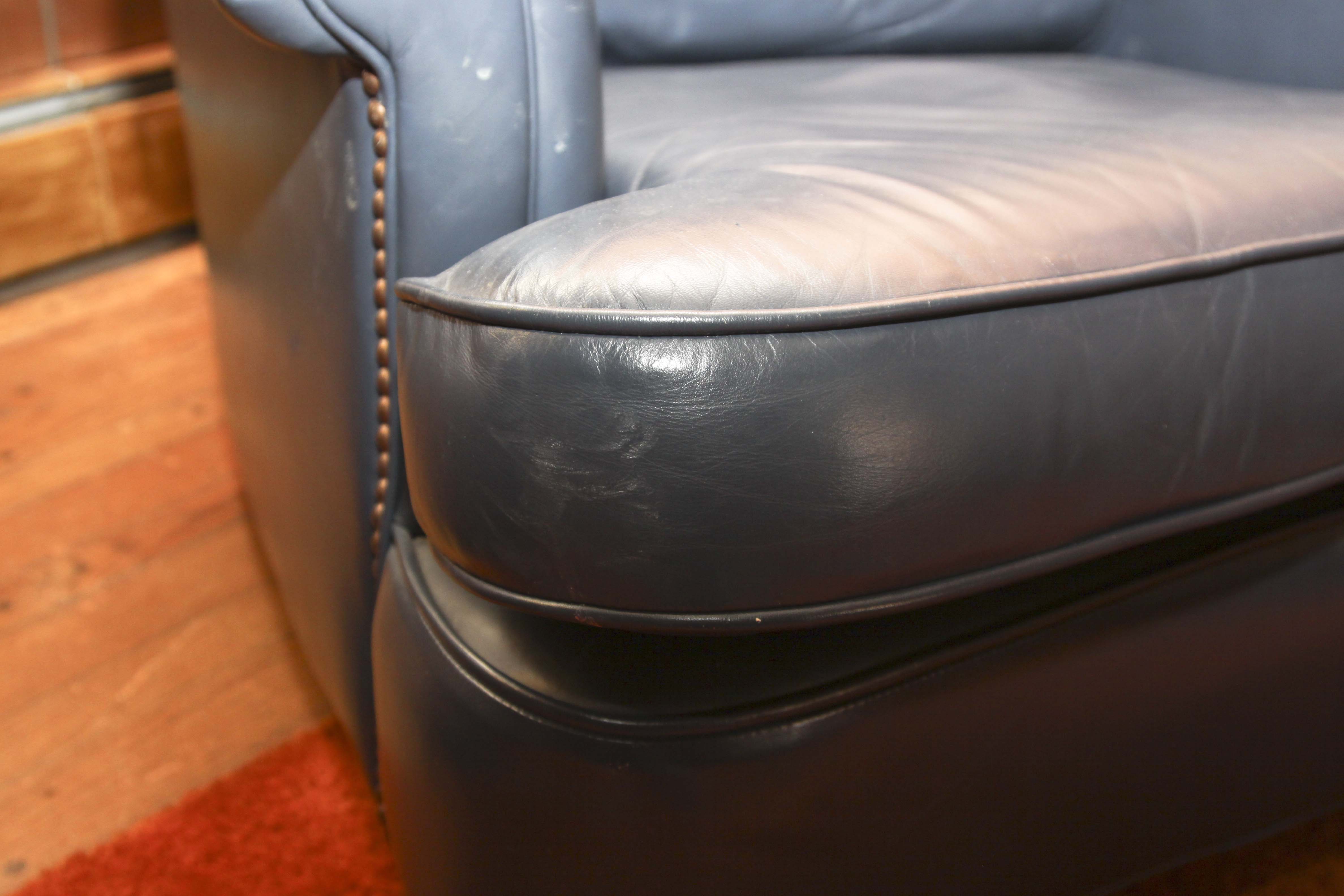 Navy Blue Leather Chair and Ottoman EBTH