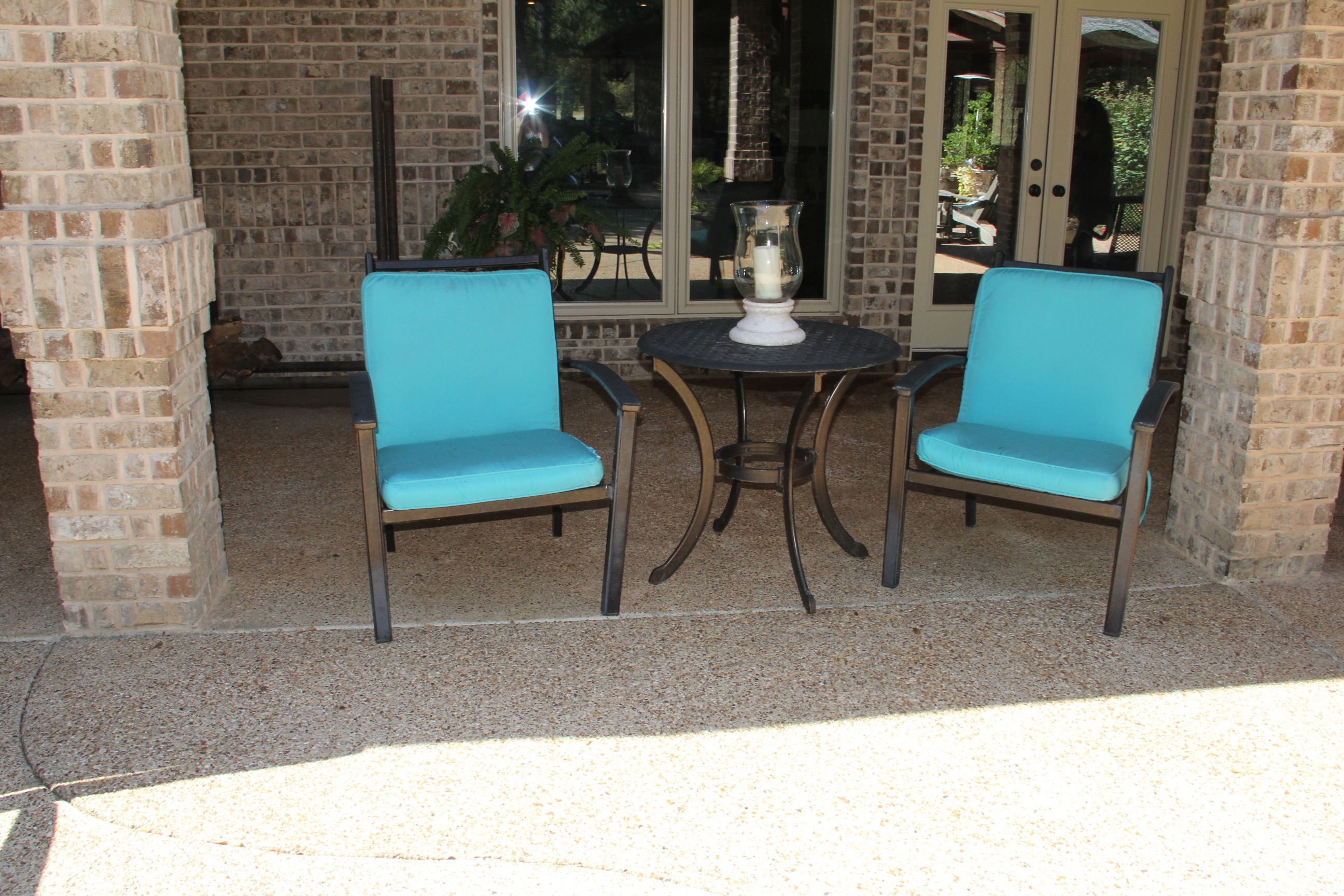 Pair of Metal Patio Chairs with Sunbrella Cushions and Metal Patio