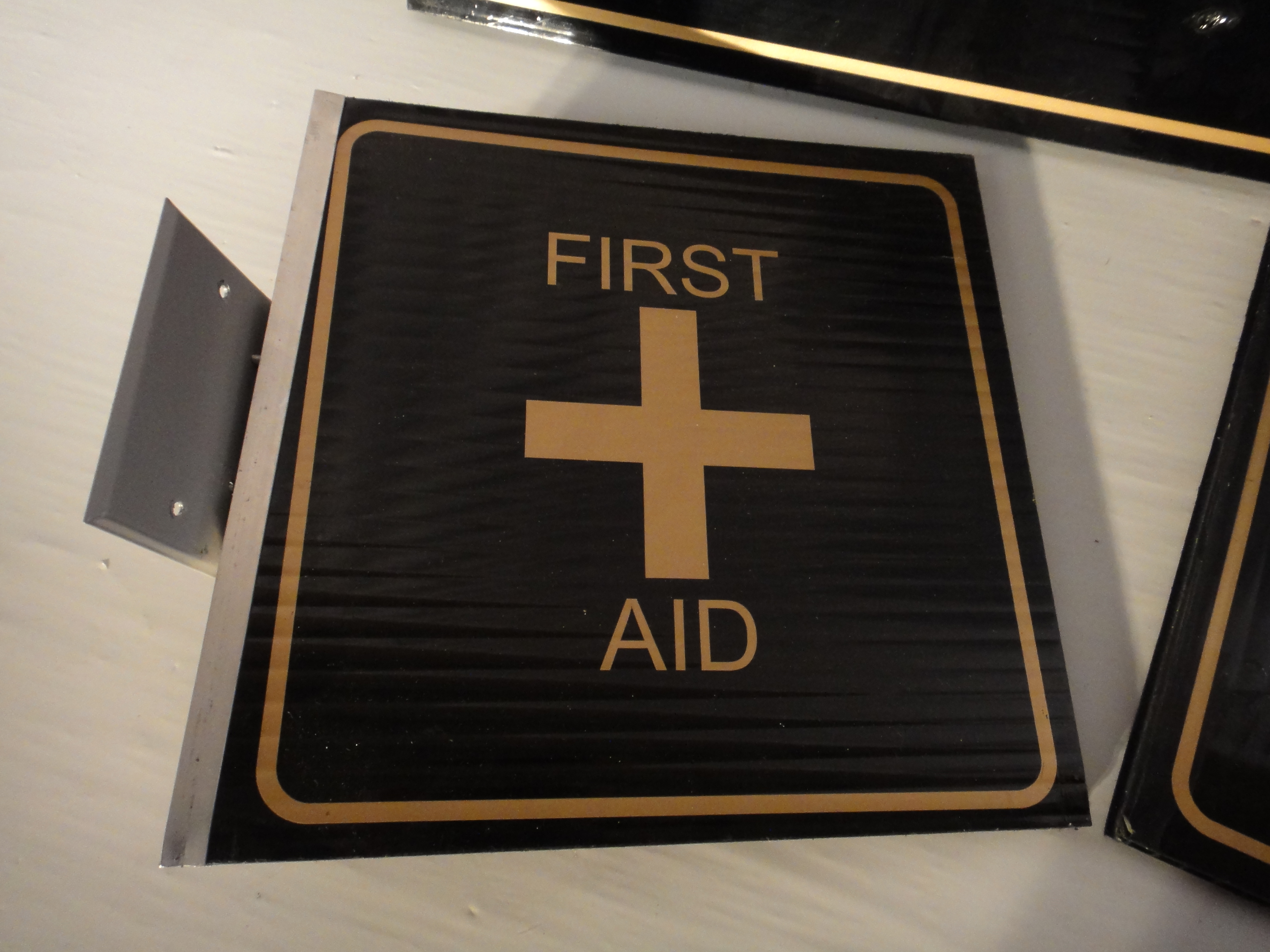 Hara Arena First Aid, Security and Restroom Signs | EBTH