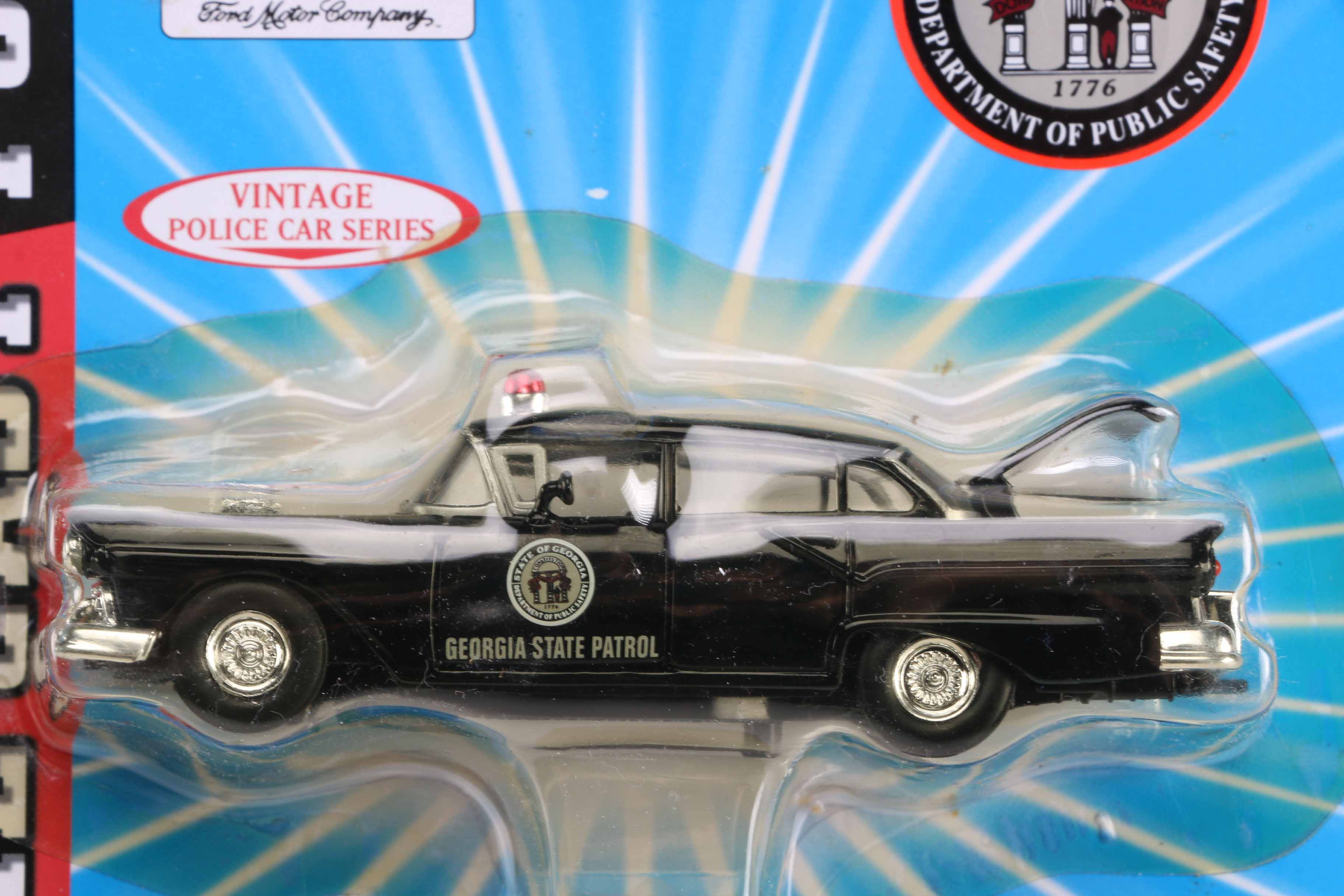 Assortment of Road Champs State Trooper Toy Cars EBTH