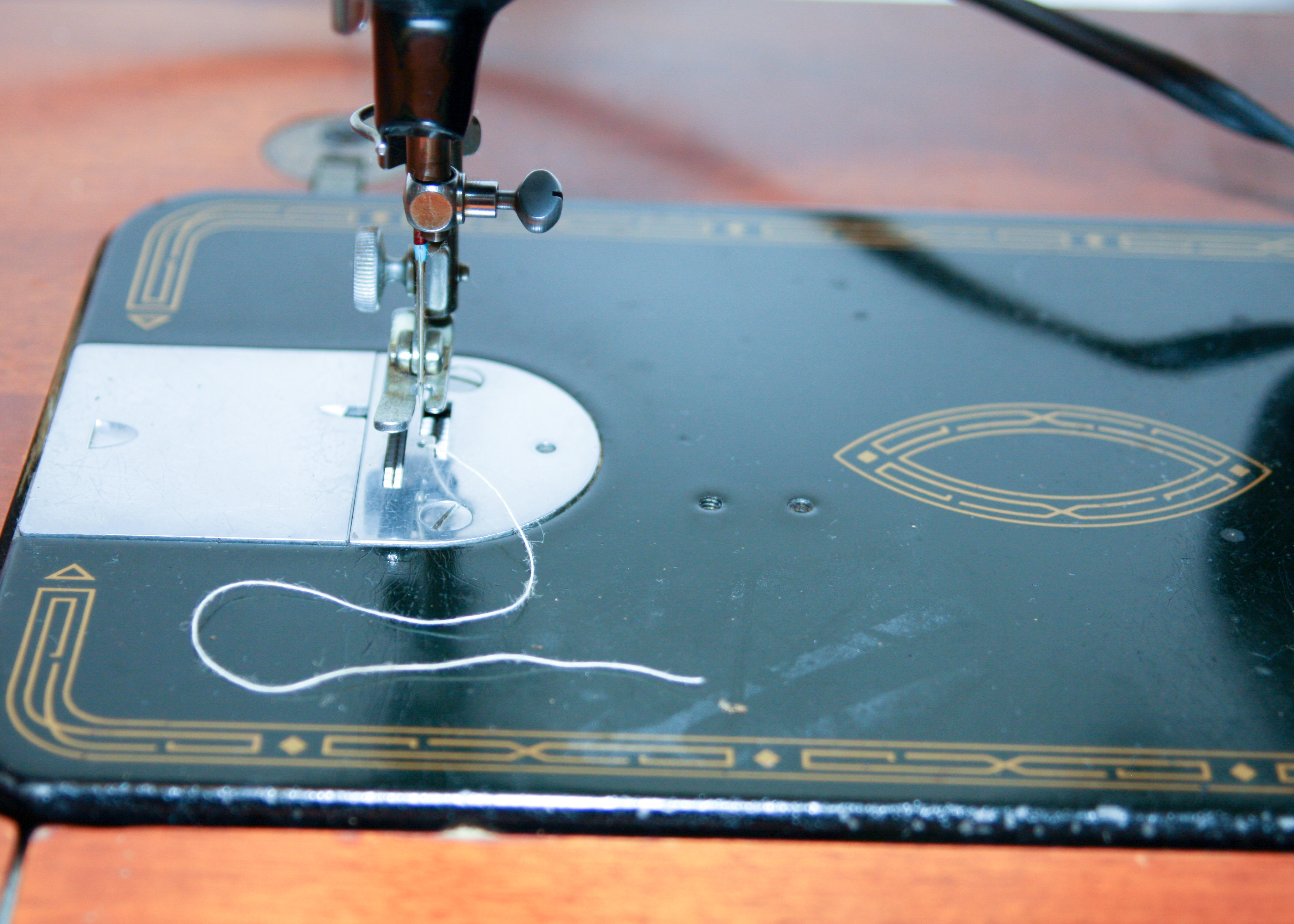 1956 Singer Sewing Machine in with Stool and Supplies EBTH