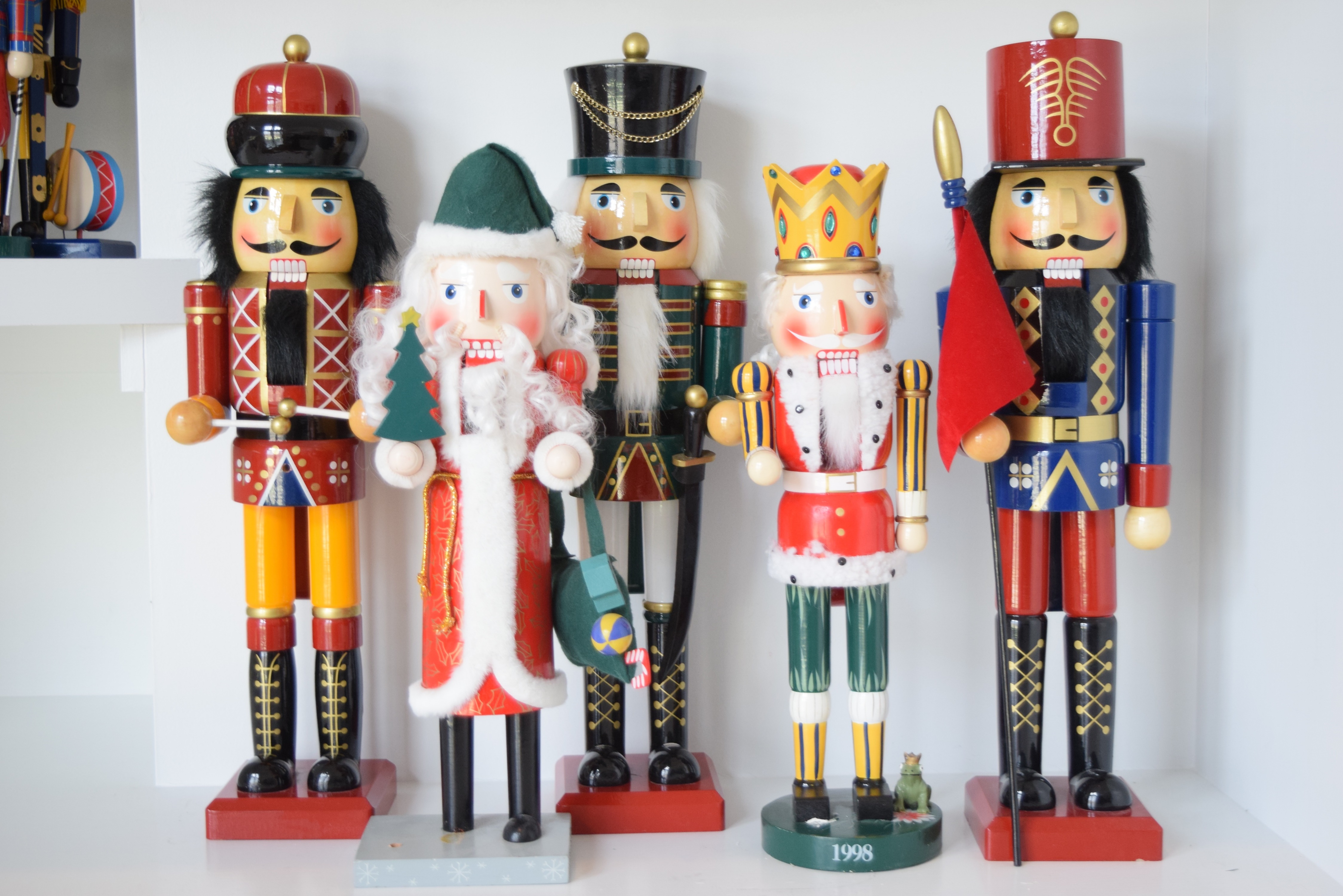 An Assortment of Sixteen Wooden Nutcrackers in Various Sizes EBTH