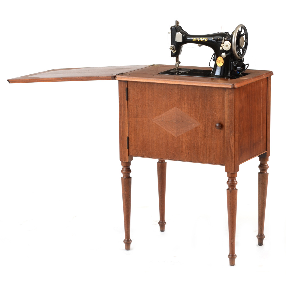 Vintage Singer Sewing Machine in Walnut Stand EBTH