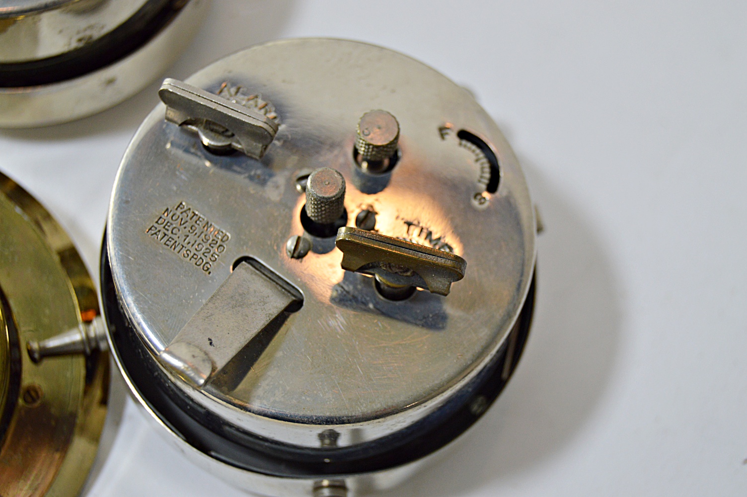 Four 1920s Alarm Clocks and Elgin Swivel Clock on Marble Base EBTH