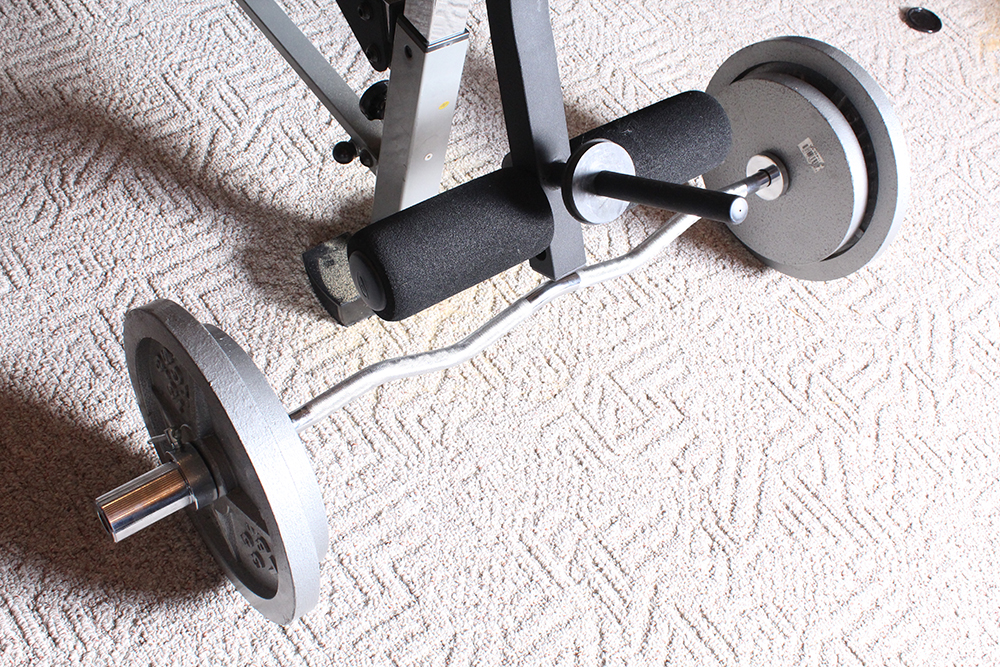 Nautilus FoldUp Olympic Weight Bench with Accessories EBTH