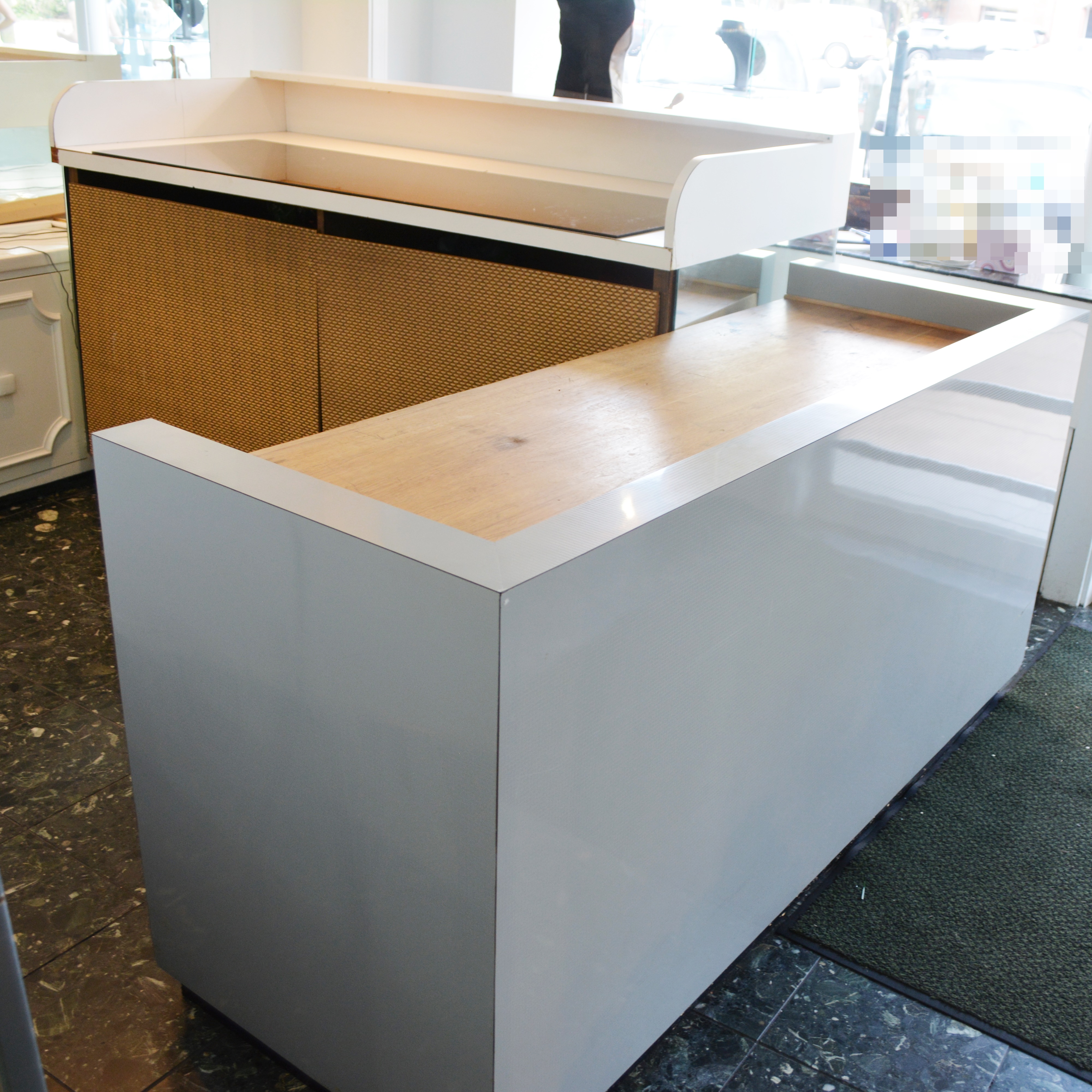 Grey Laminate Reception Desk And Mirrored Casework Ebth