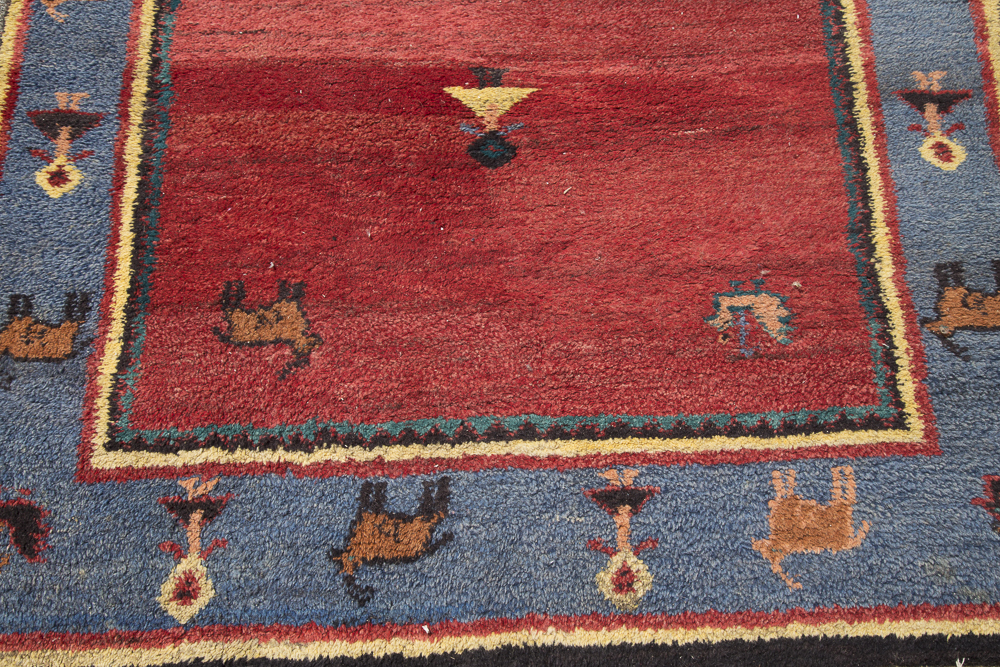 Handmade Human and Animal Motif Area Rug EBTH