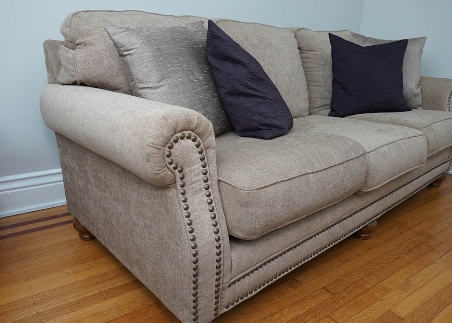 ashley furniture taupe leather sofa