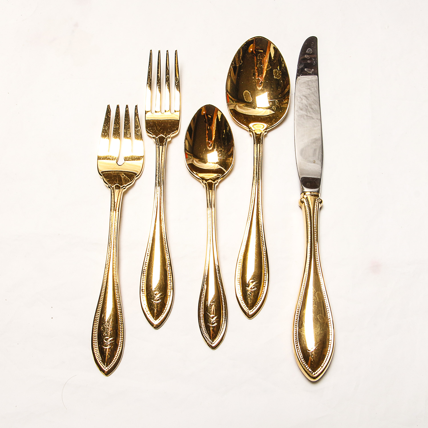 Set of Oneida Gold Plated Flatware EBTH
