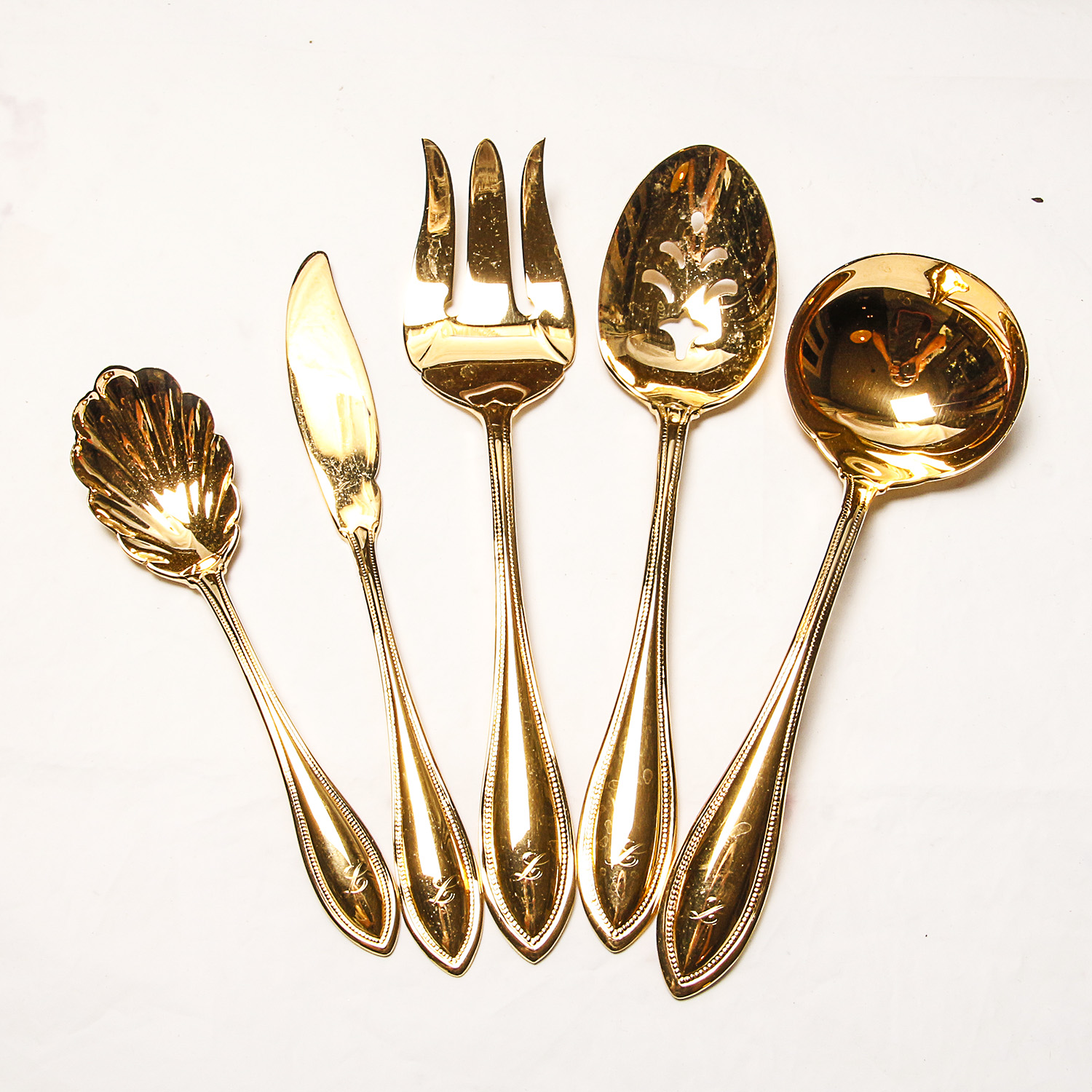 Set of Oneida Gold Plated Flatware EBTH