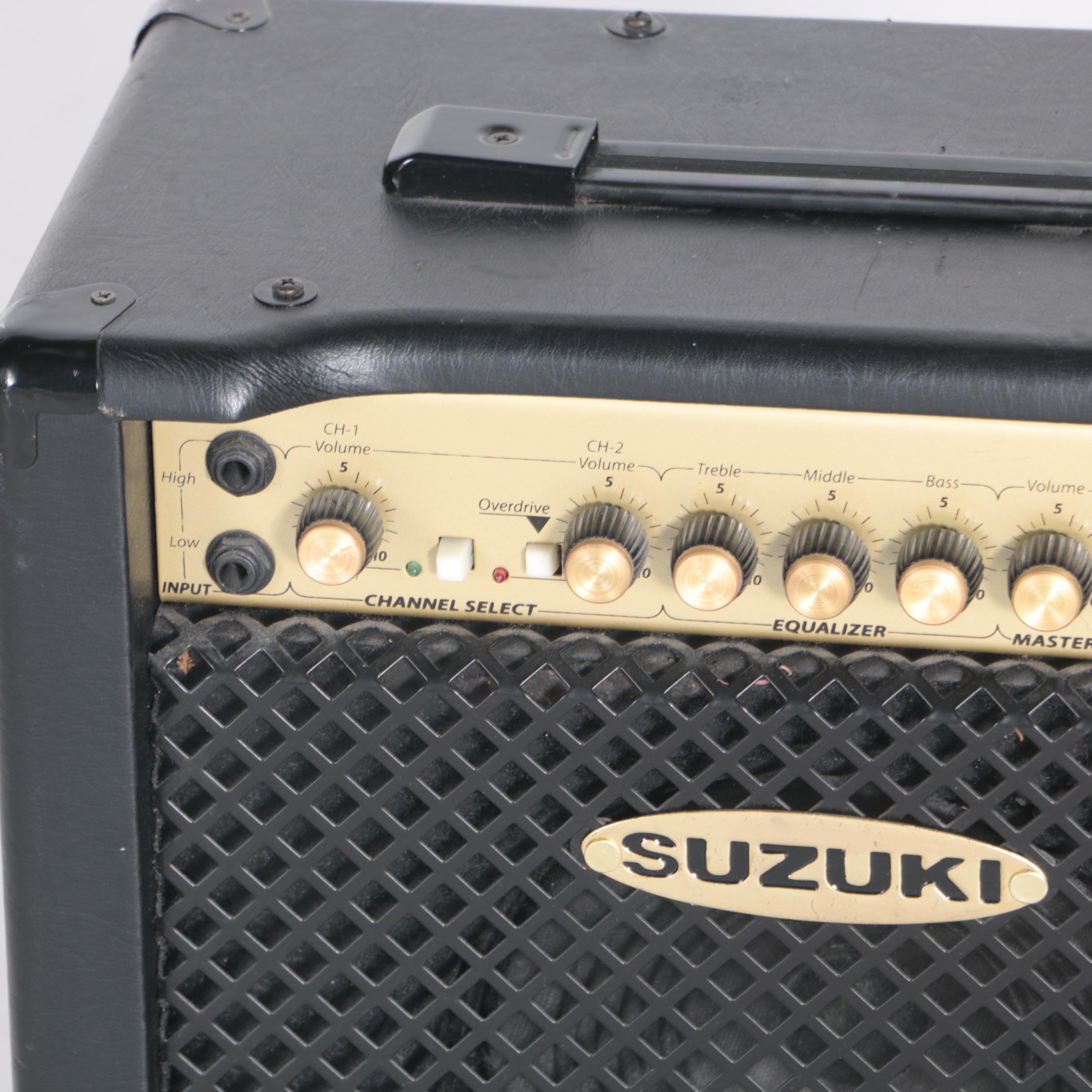 Suzuki Electric Bass Guitar, Amplifier, Case and Stool EBTH