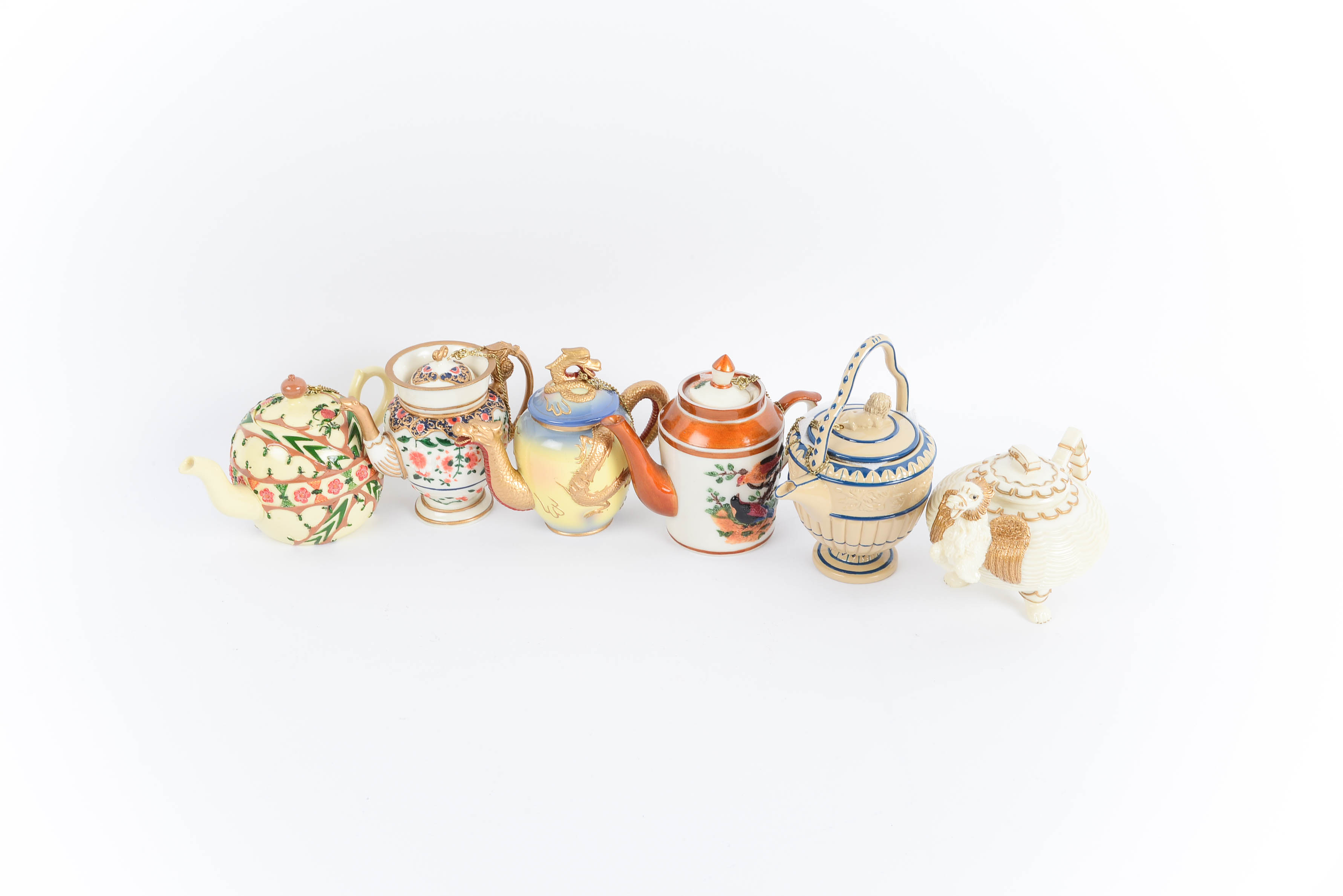 Collection of Nini HandPainted Miniature Teapots EBTH