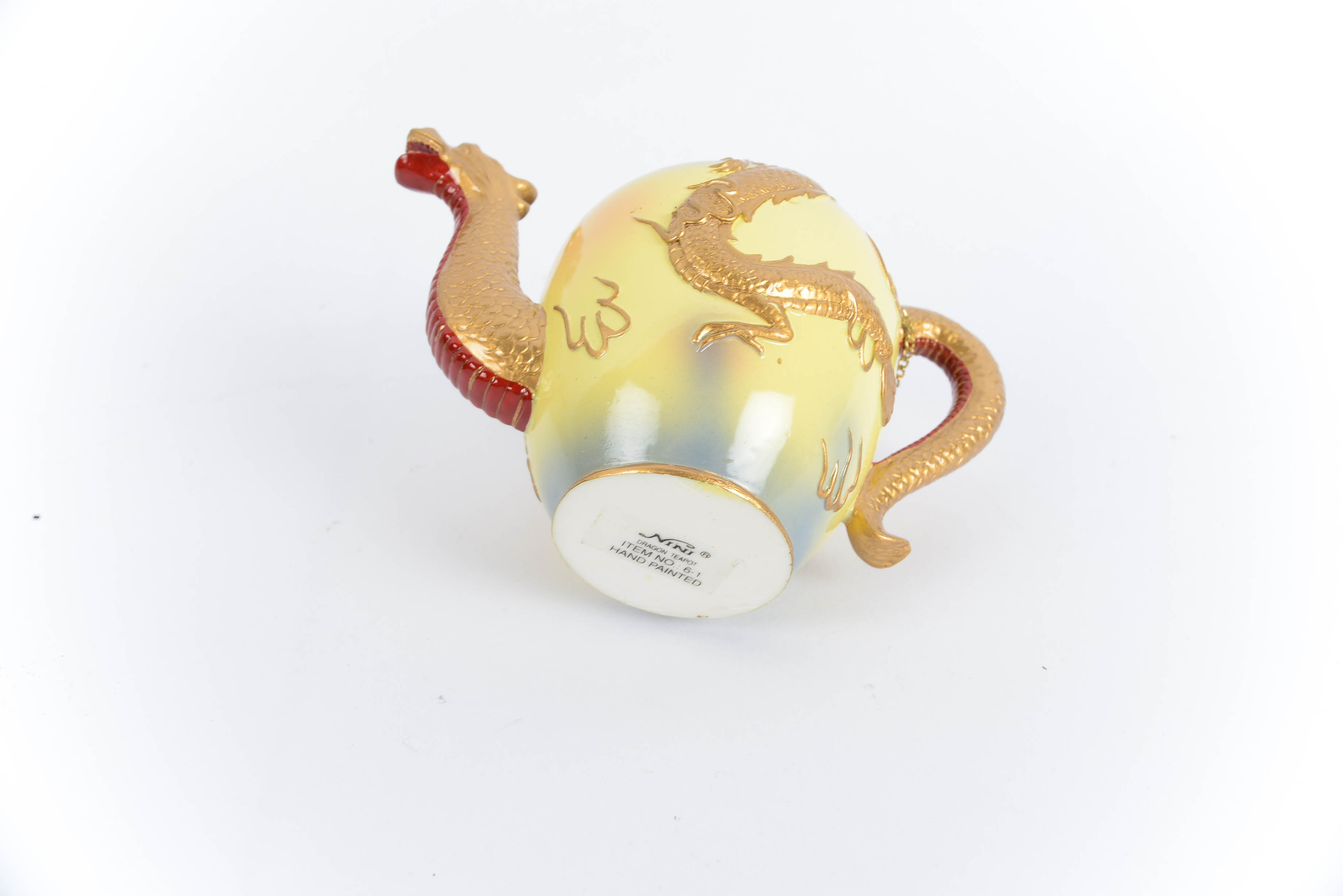 Collection of Nini HandPainted Miniature Teapots EBTH