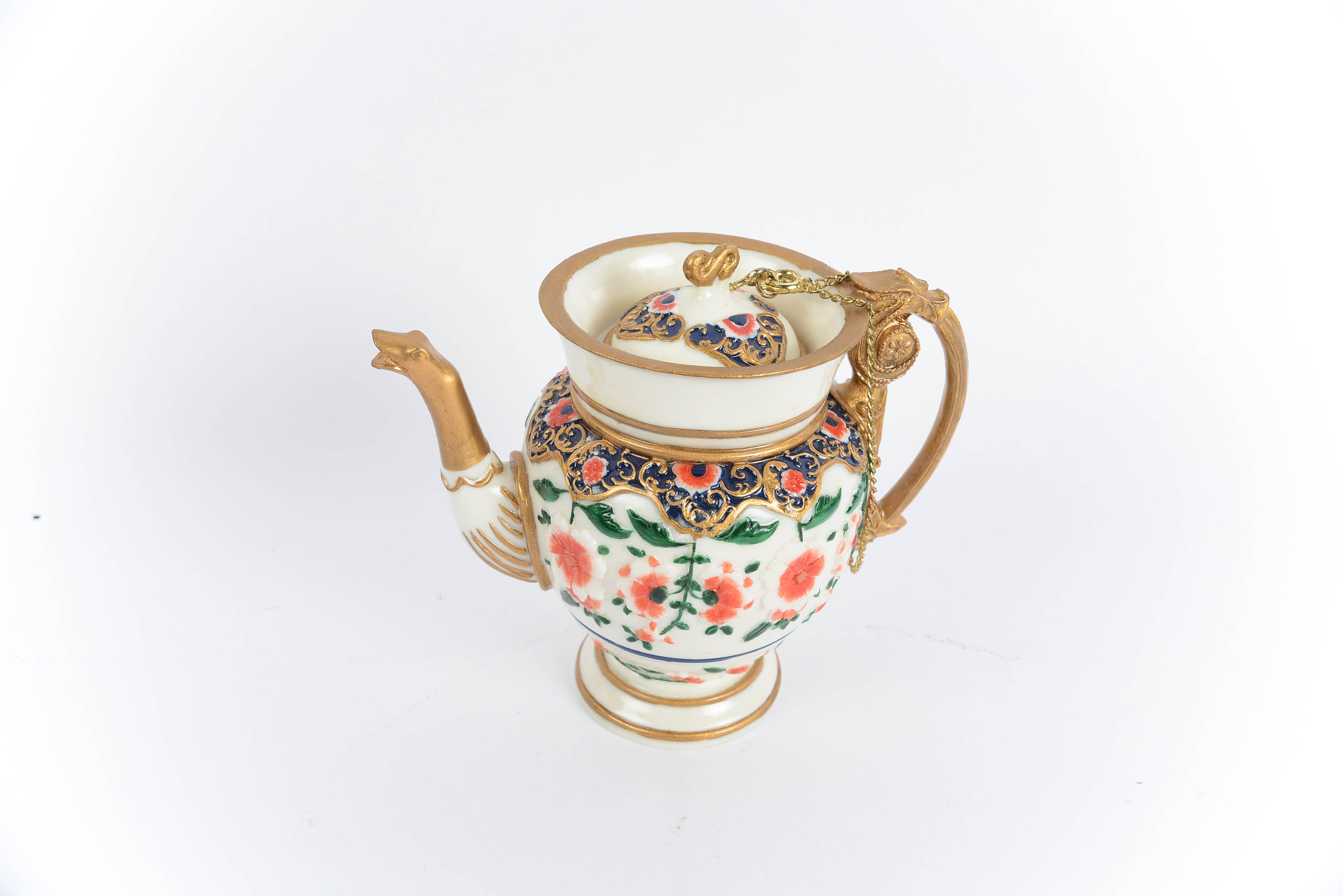 Collection of Nini HandPainted Miniature Teapots EBTH