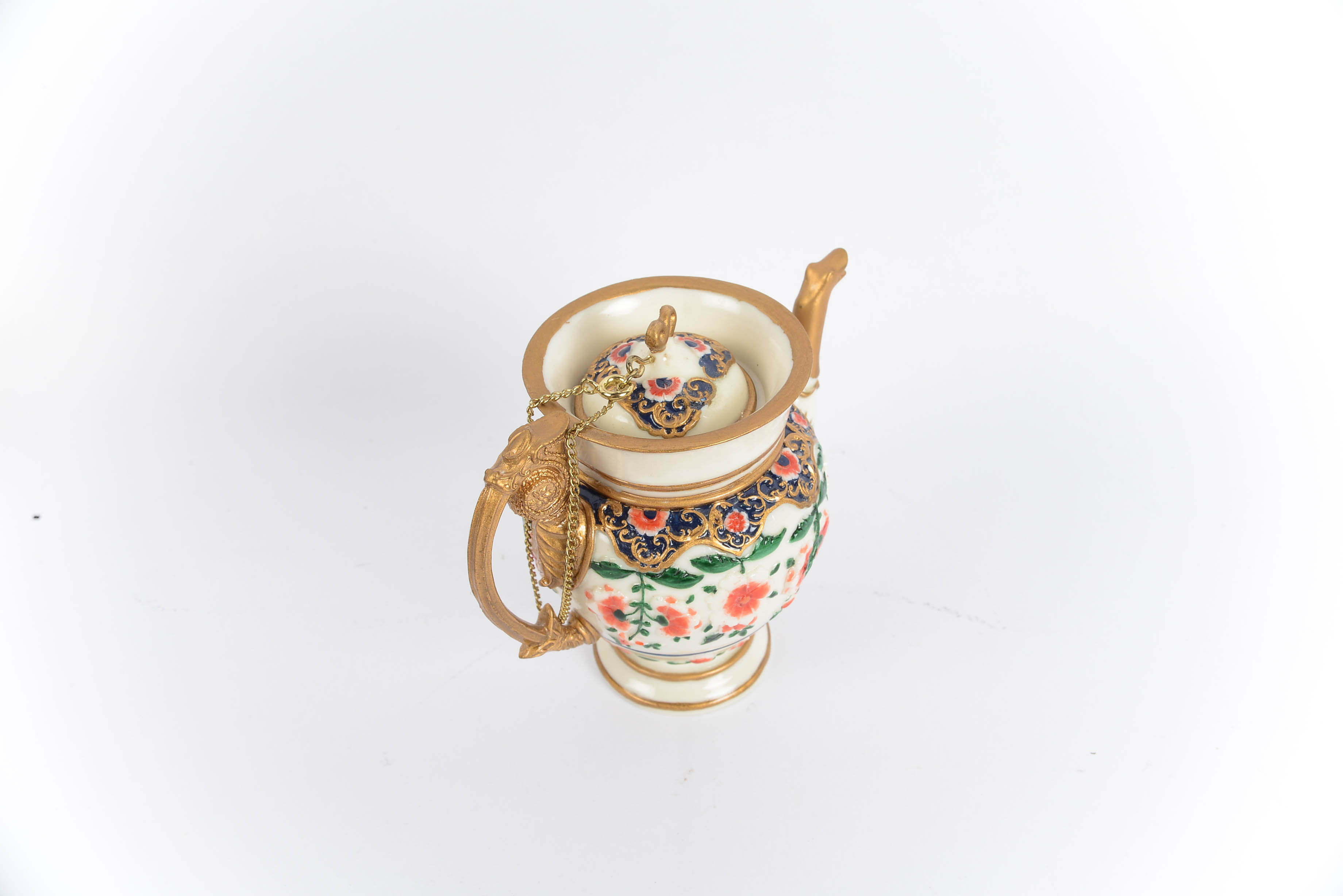 Collection of Nini HandPainted Miniature Teapots EBTH