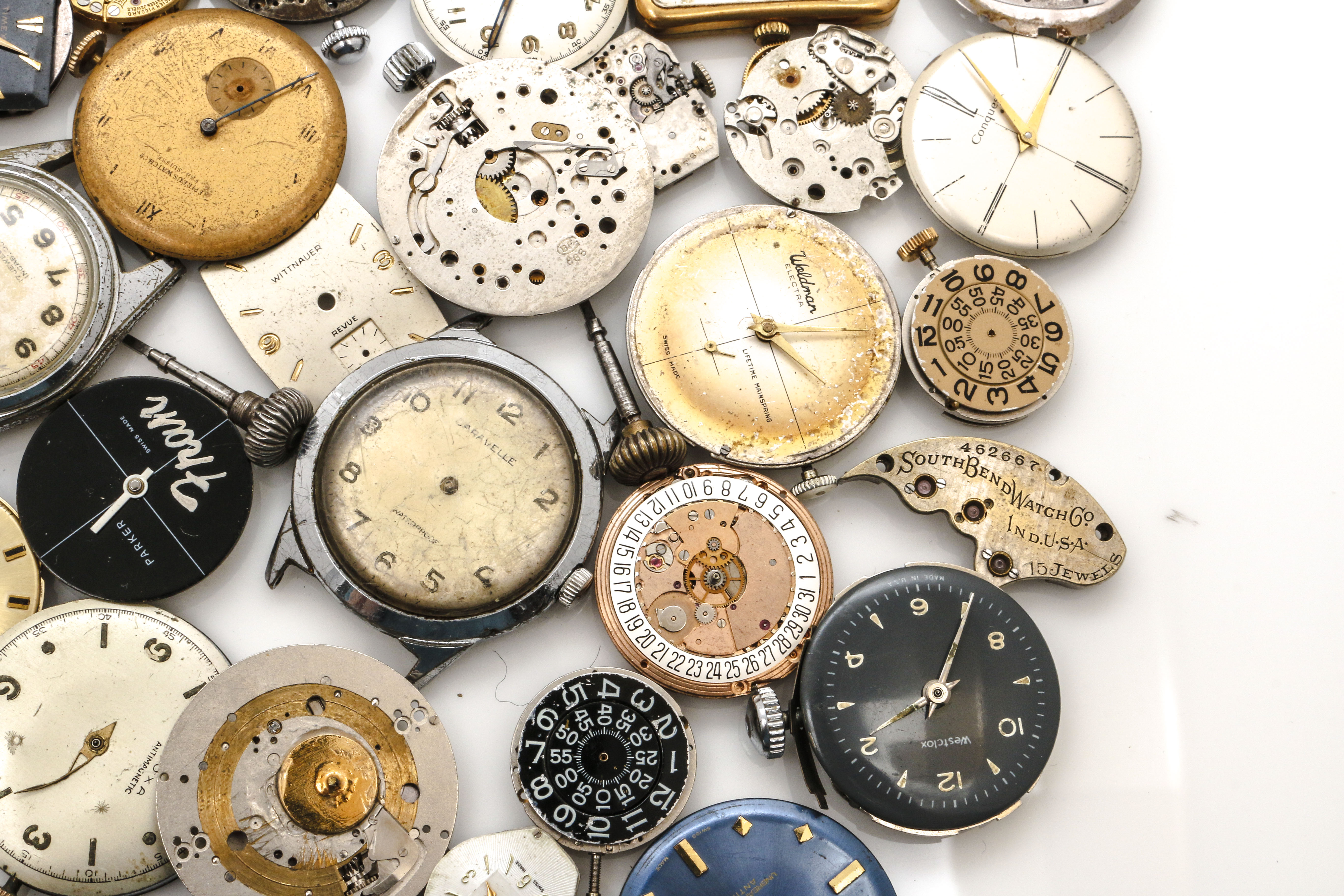 Assortment of Watch Movements, Dials, Cases, and Parts EBTH