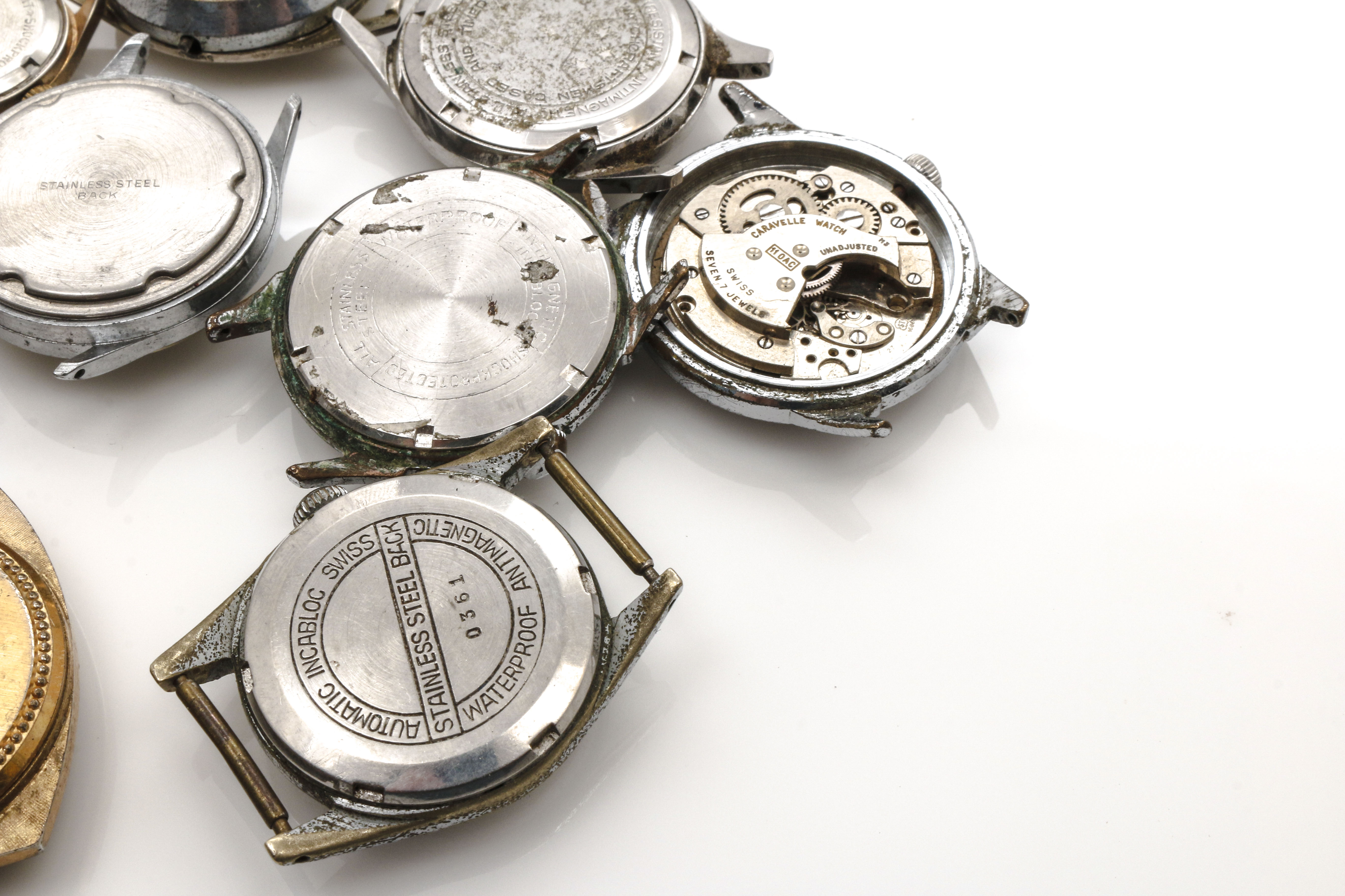 Assortment of Watch Movements, Dials, Cases, and Parts EBTH