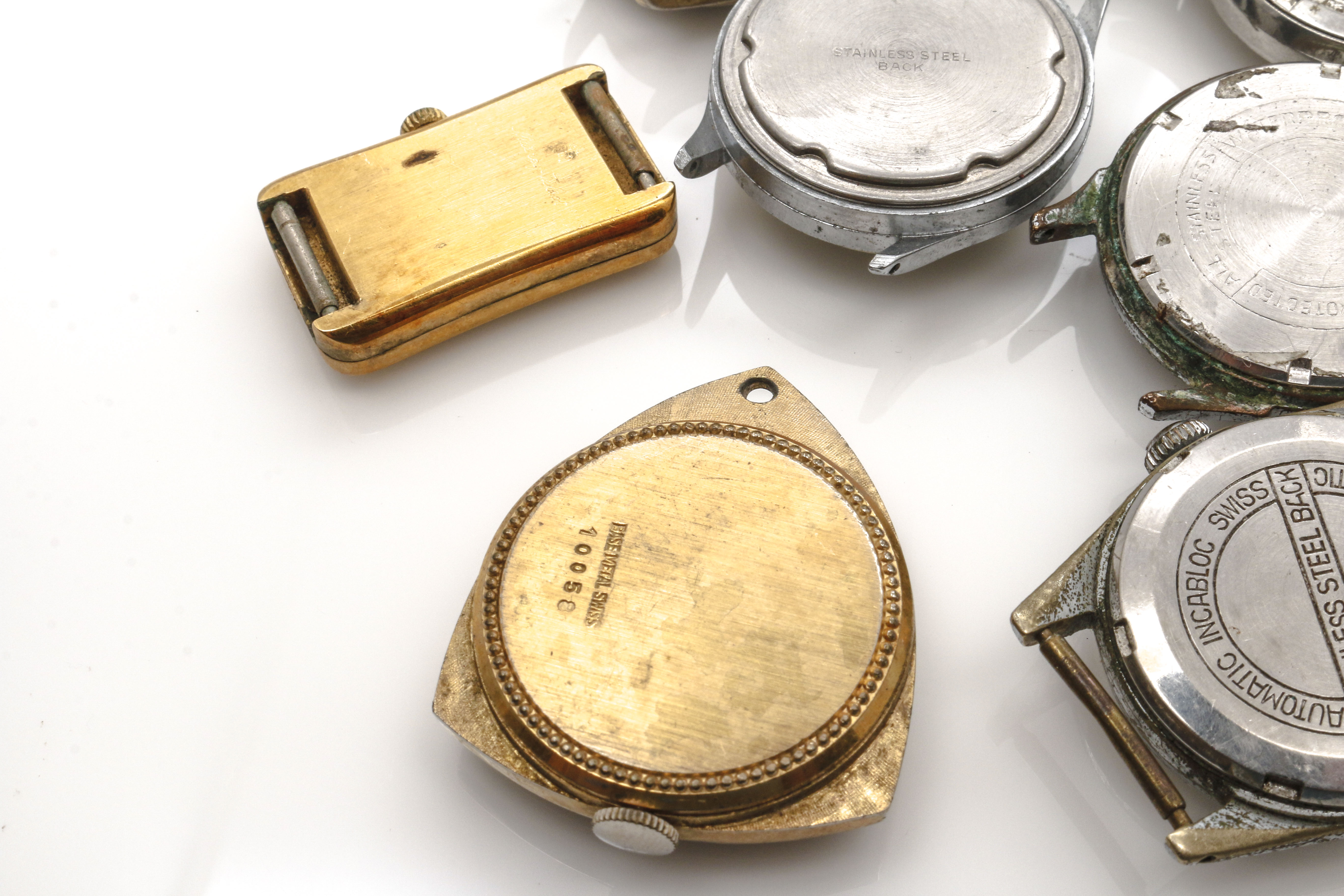 Assortment of Watch Movements, Dials, Cases, and Parts EBTH