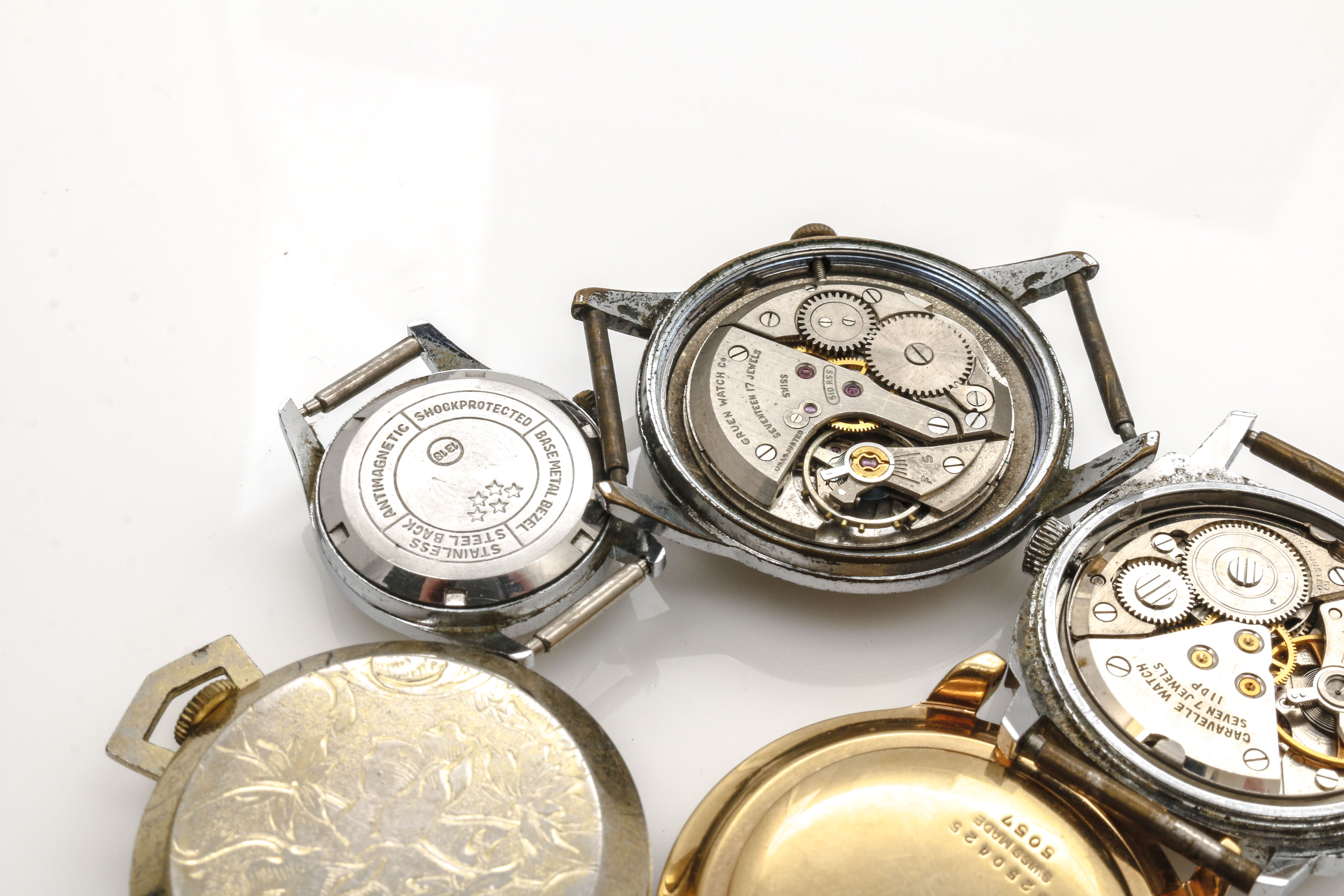 Assortment of Watch Movements, Dials, Cases, and Parts EBTH