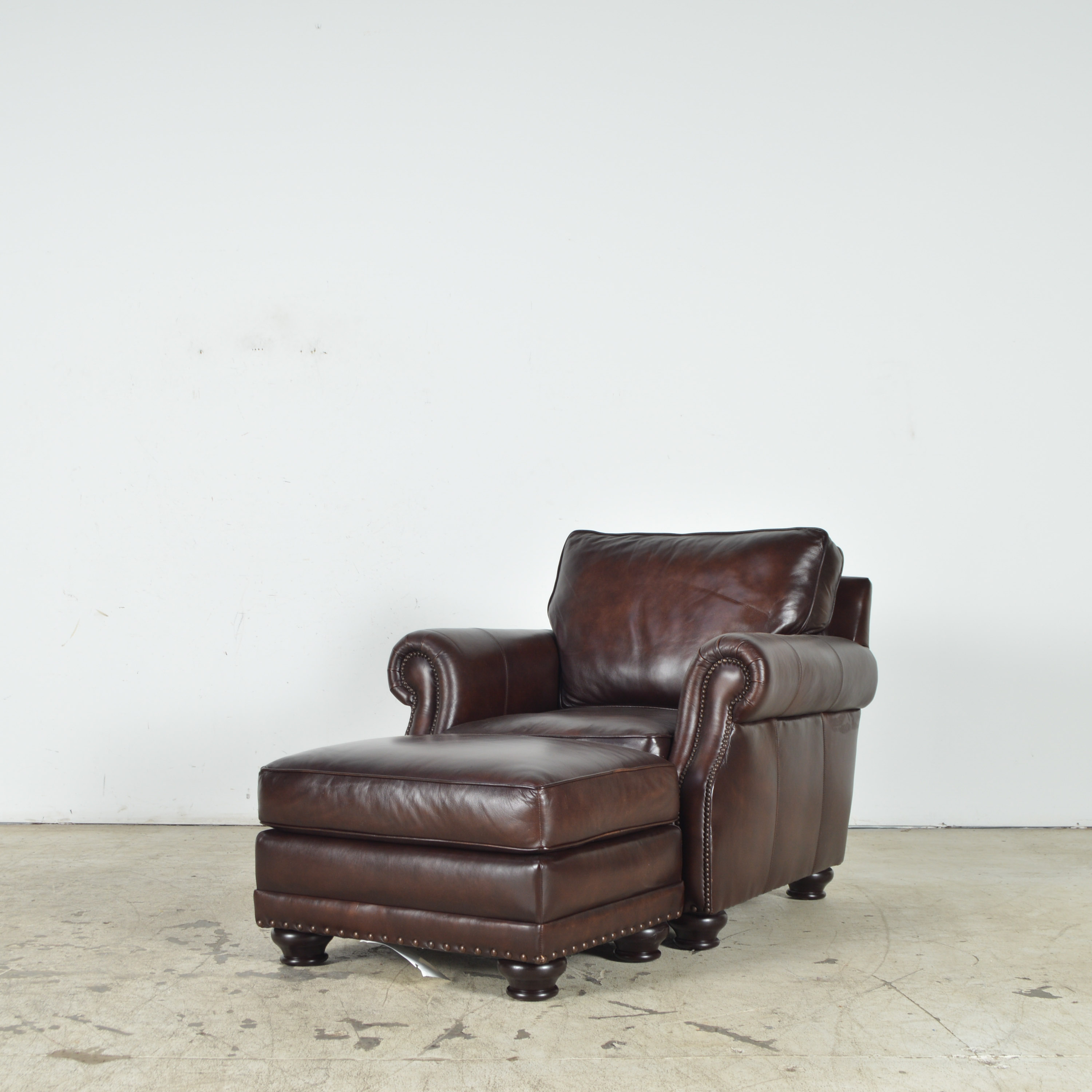 Havertys Furniture Brown Leather Armchair with Ottoman EBTH