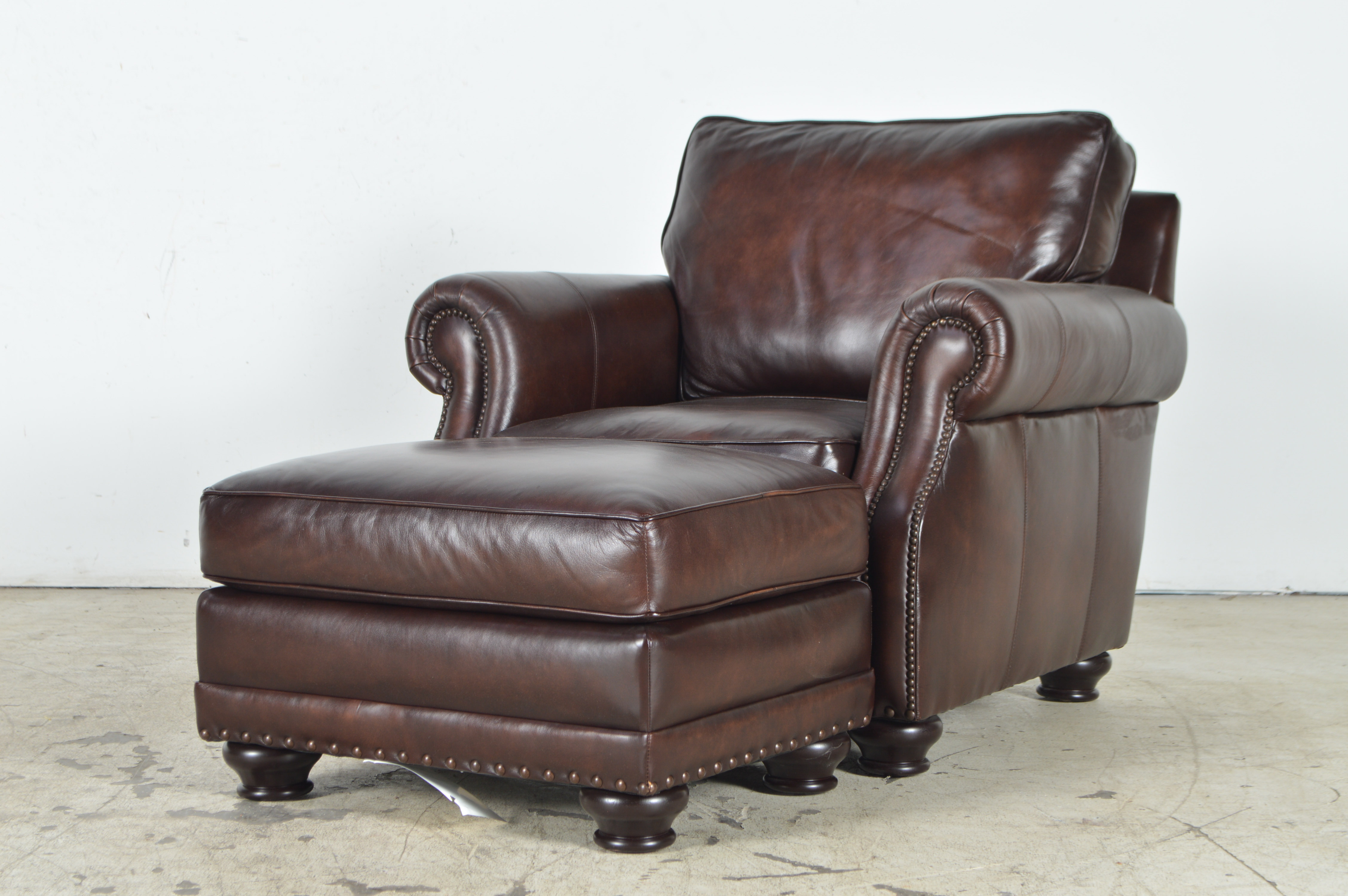 Havertys Furniture Brown Leather Armchair with Ottoman EBTH