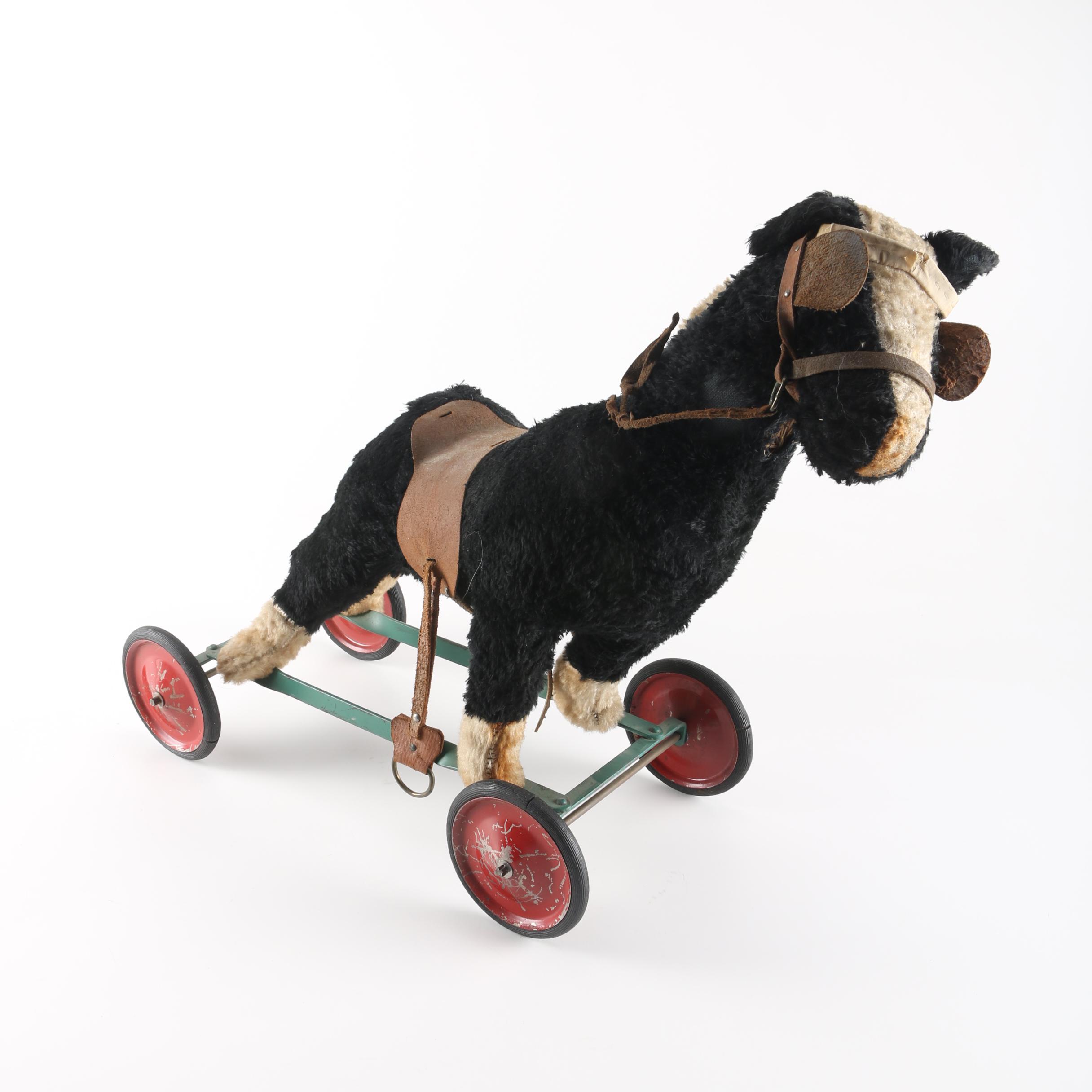 vintage riding horse toy with wheels