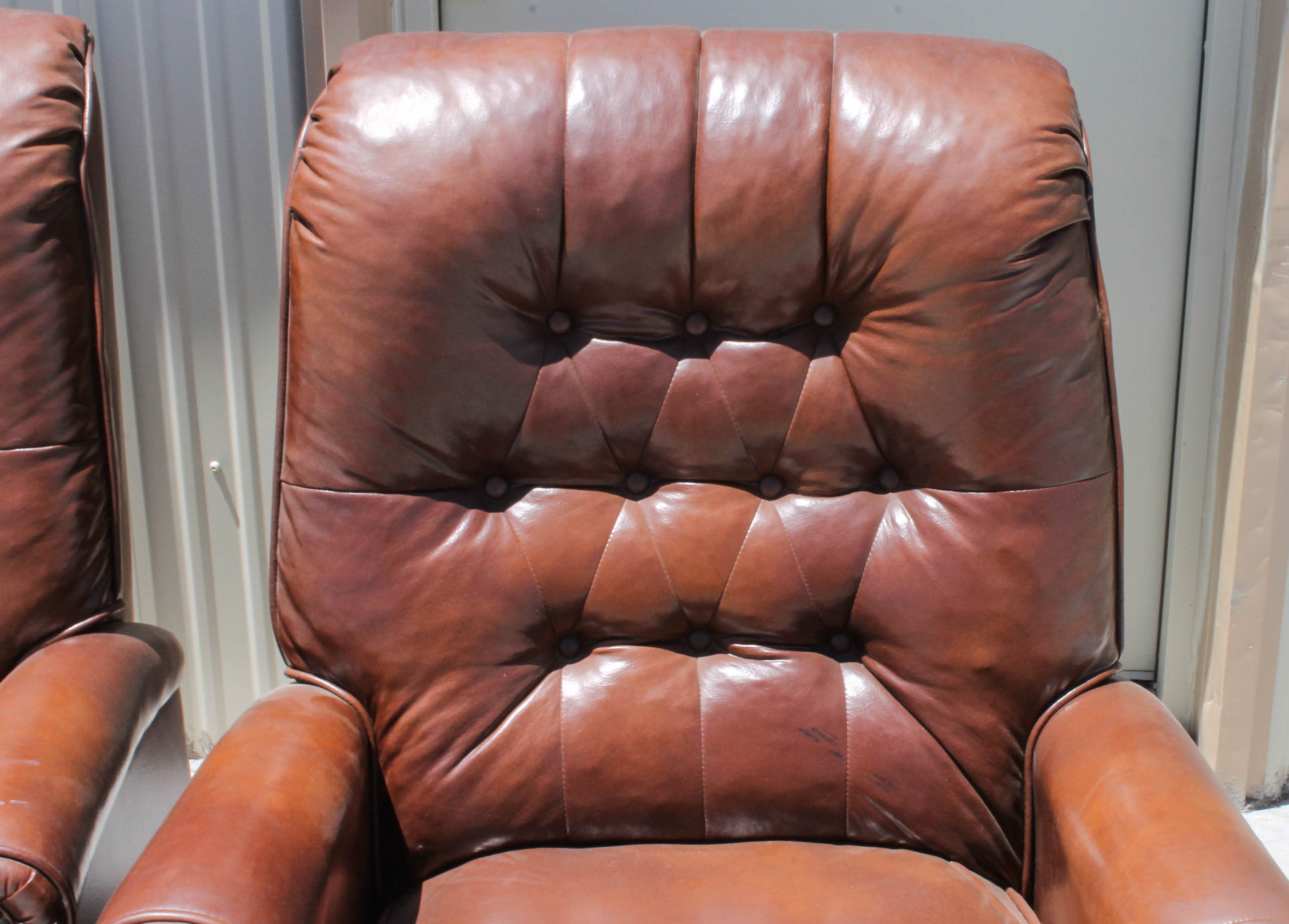 Pair of Brown Faux Leather Recliners EBTH