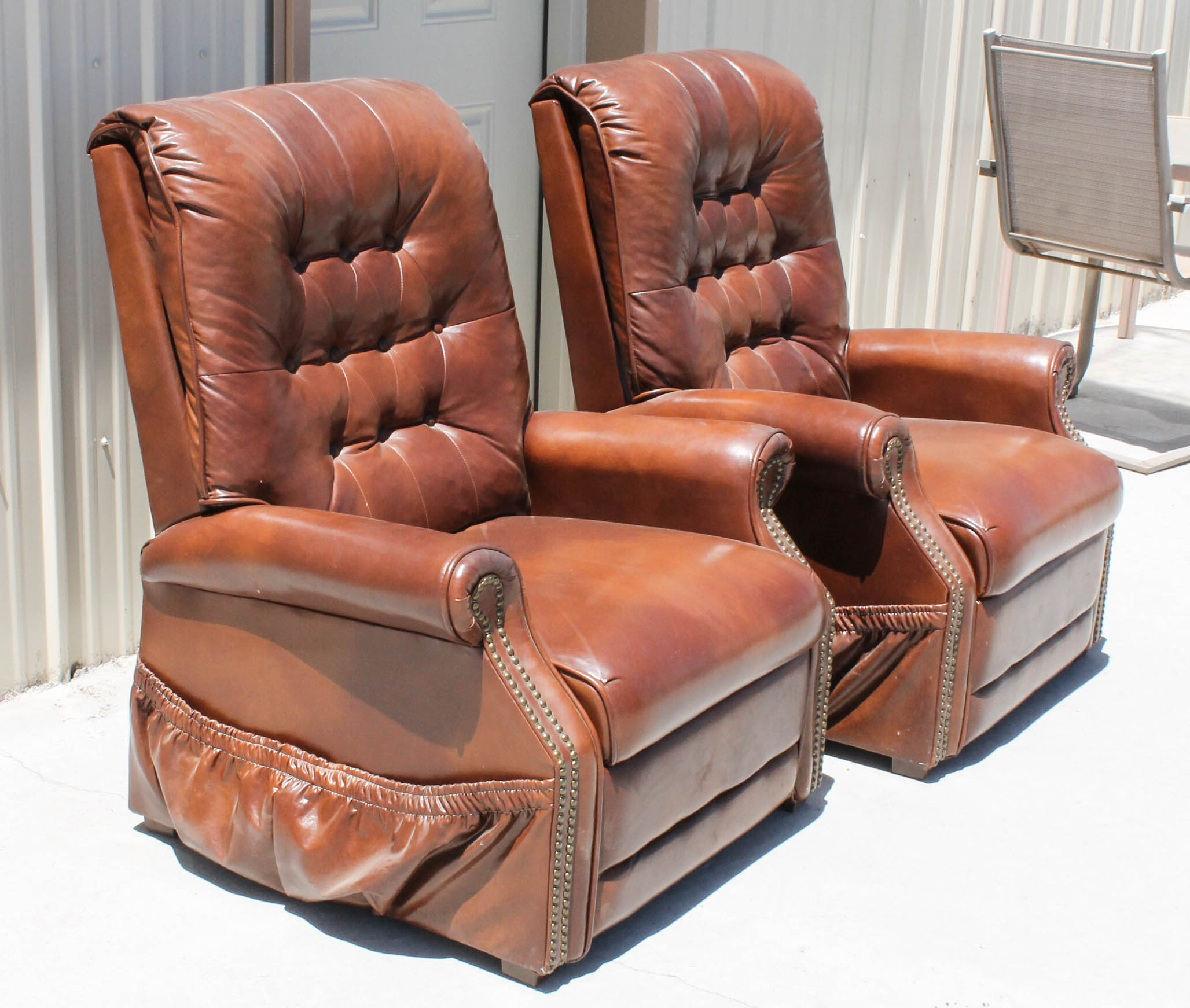 Pair of Brown Faux Leather Recliners EBTH