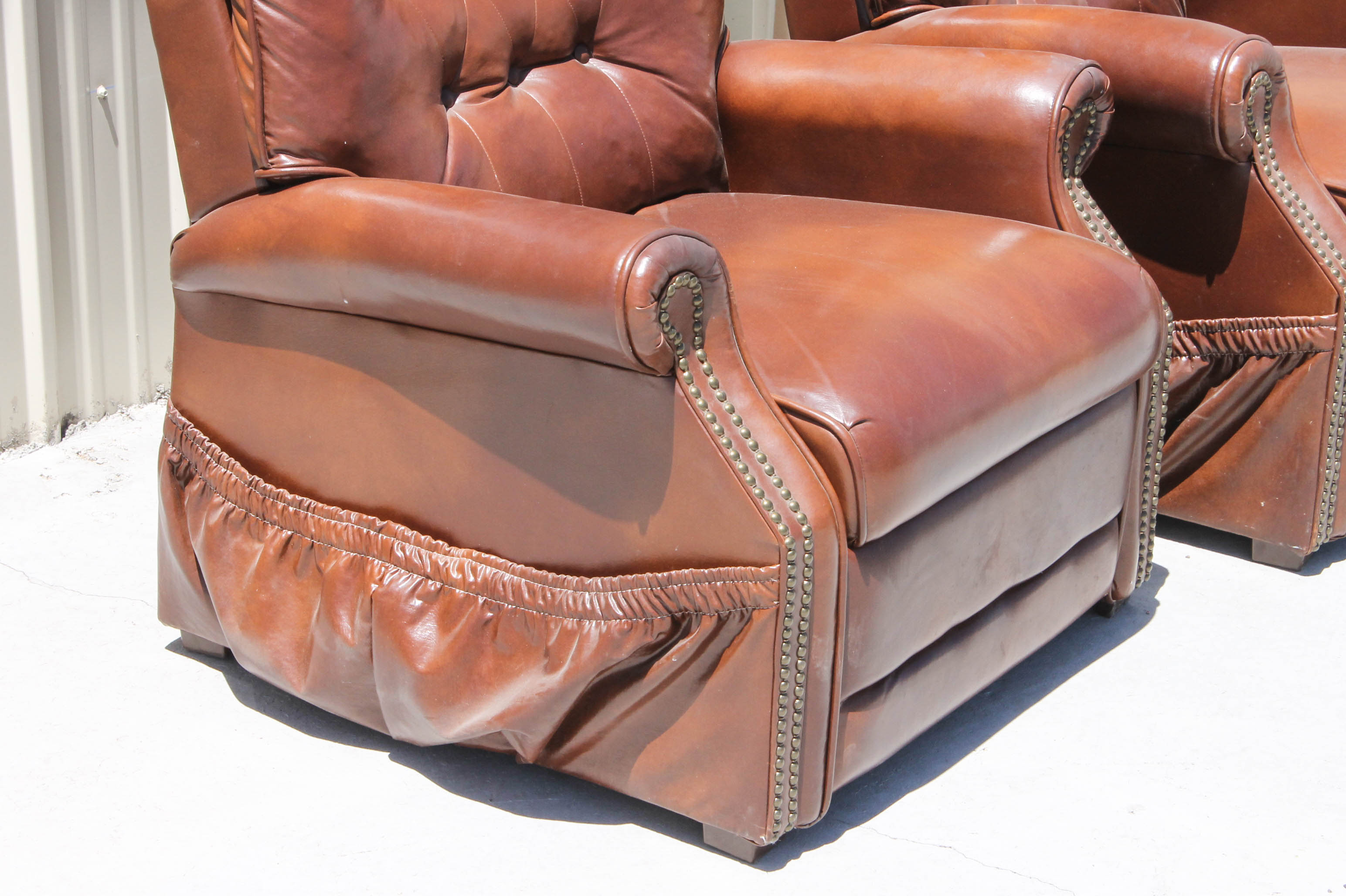 Pair of Brown Faux Leather Recliners EBTH