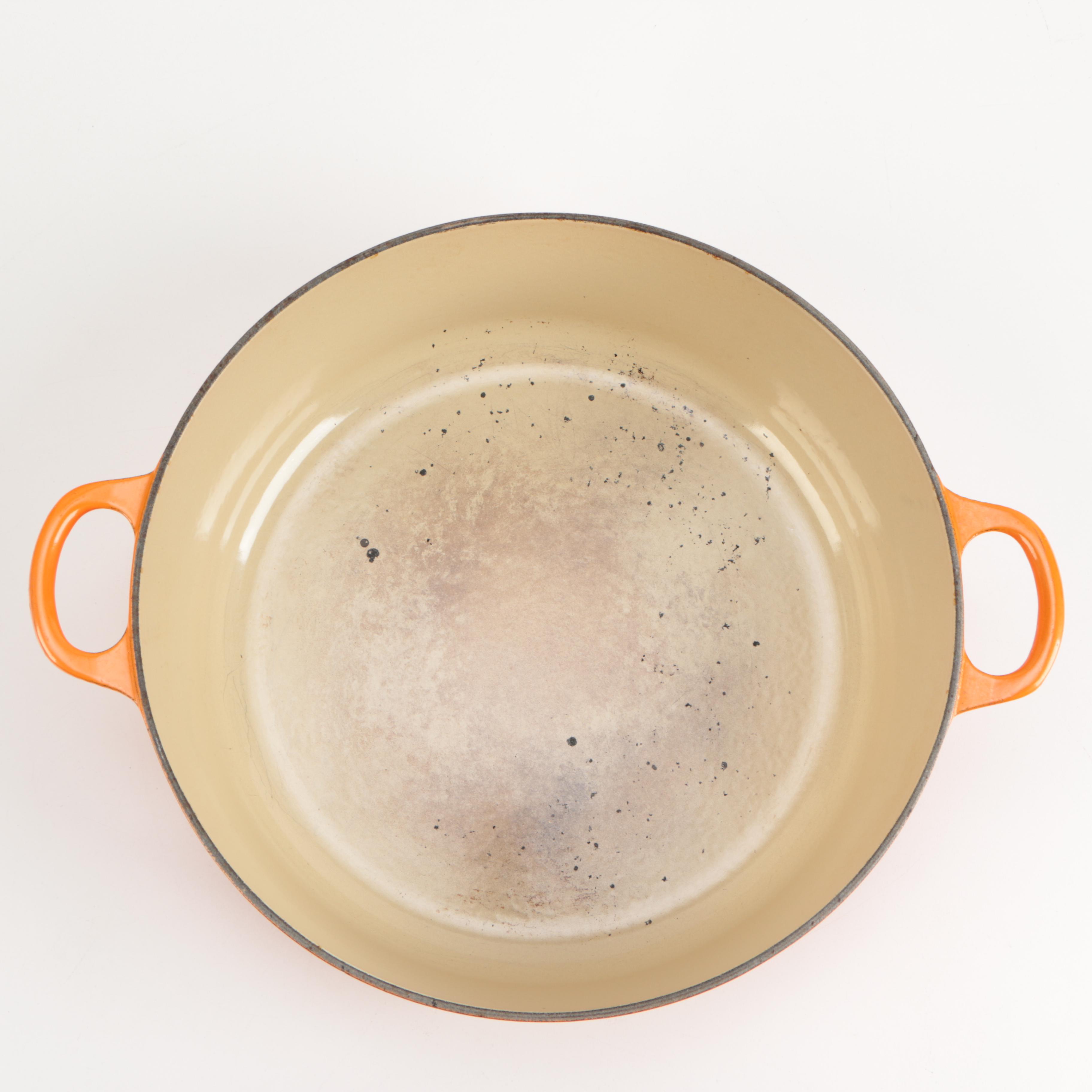 Pair of Le Creuset Orange Enamel Dutch Ovens EBTH